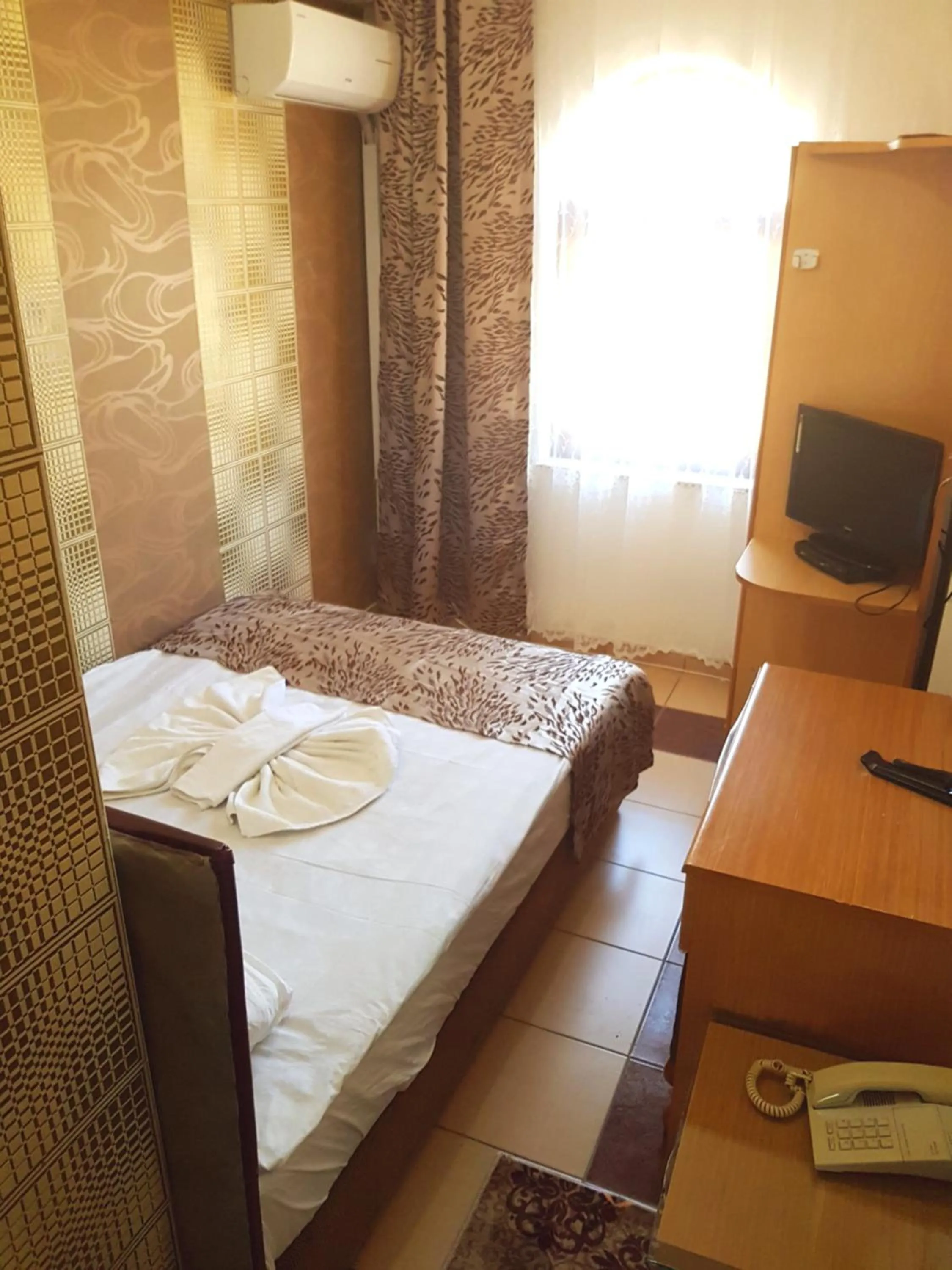 Bed in Talaslioglu Hotel