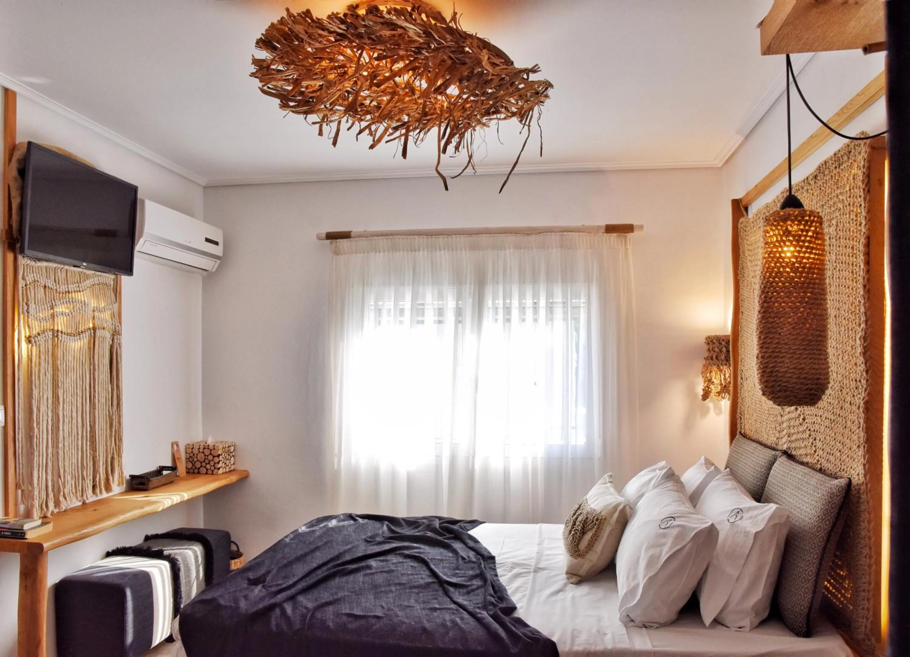 Bed in Angelos Design Suites