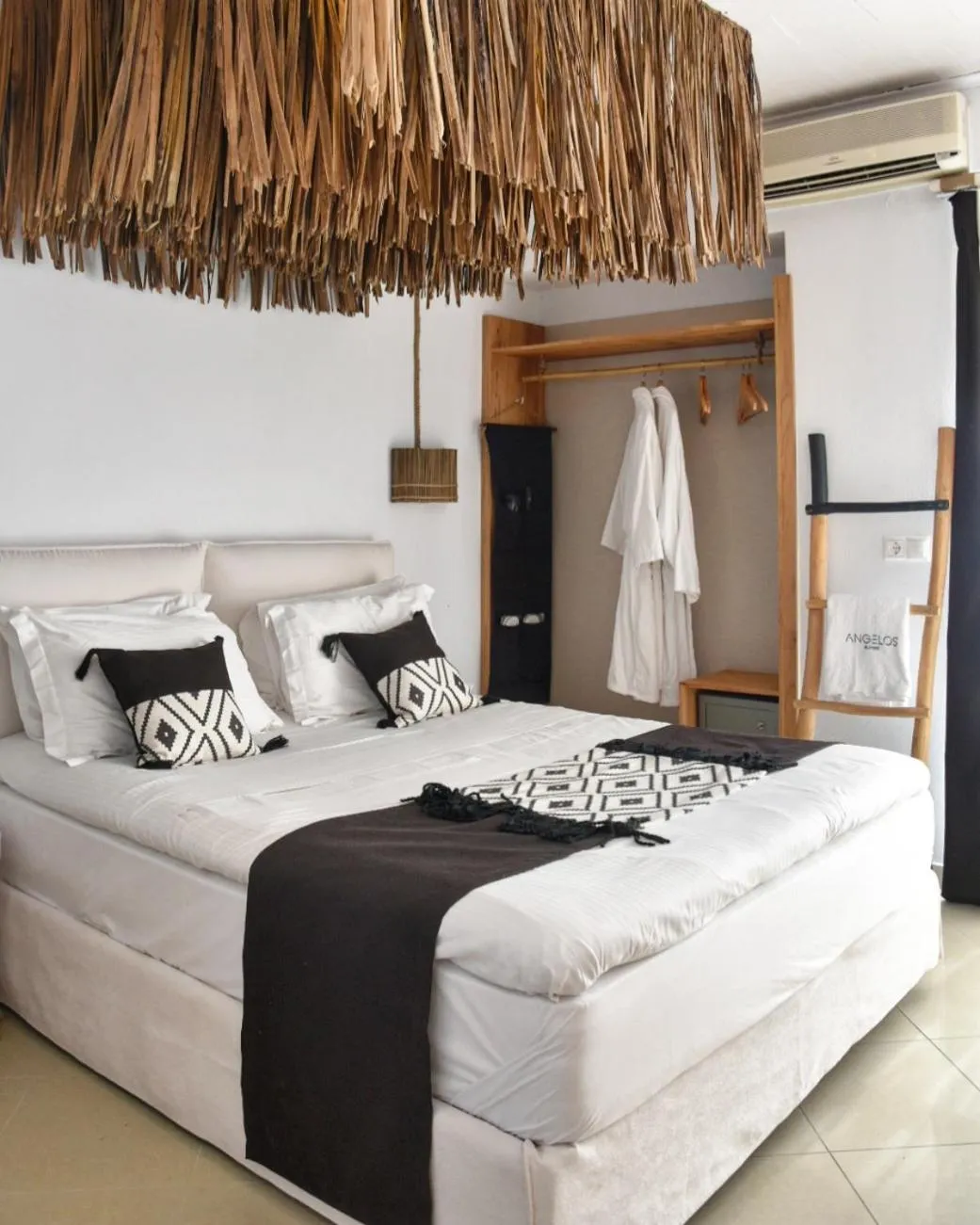 Bed in Angelos Design Suites