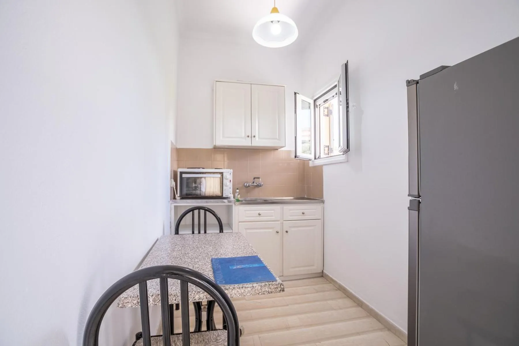 Kitchen or kitchenette in Dimitra Apartments G
