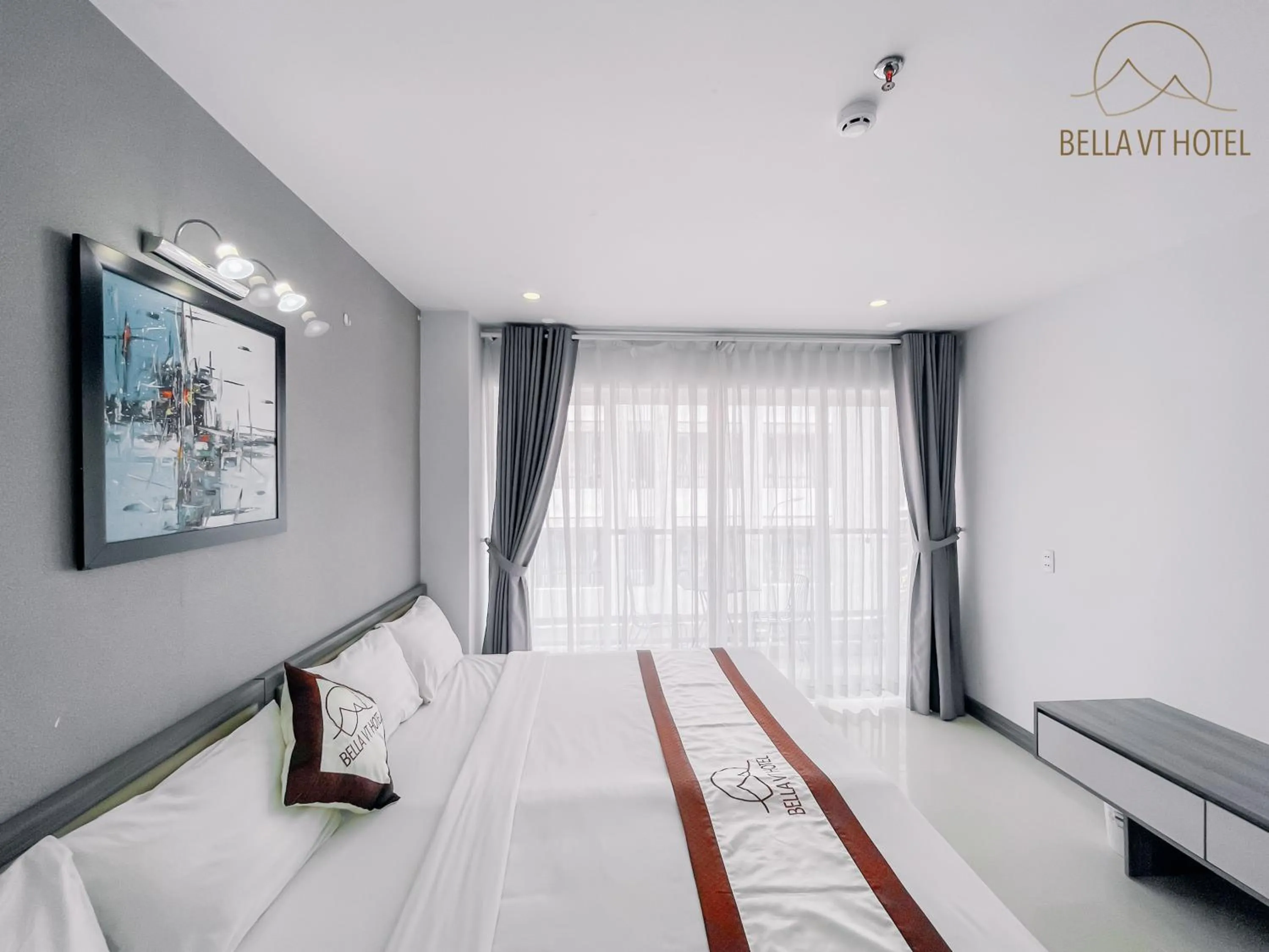 Bed in BELLA VT HOTEL