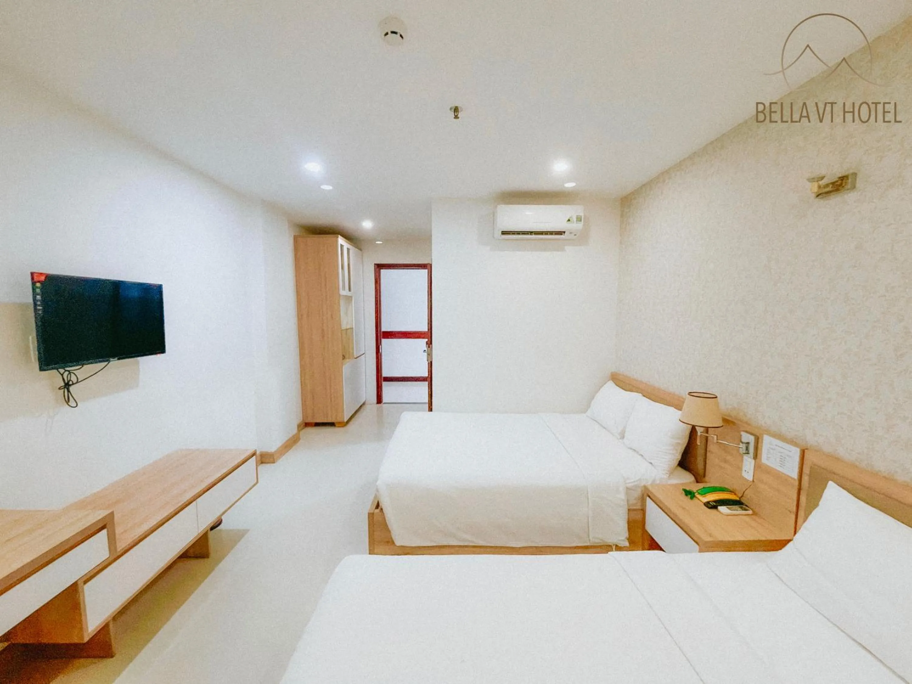 Bed in BELLA VT HOTEL