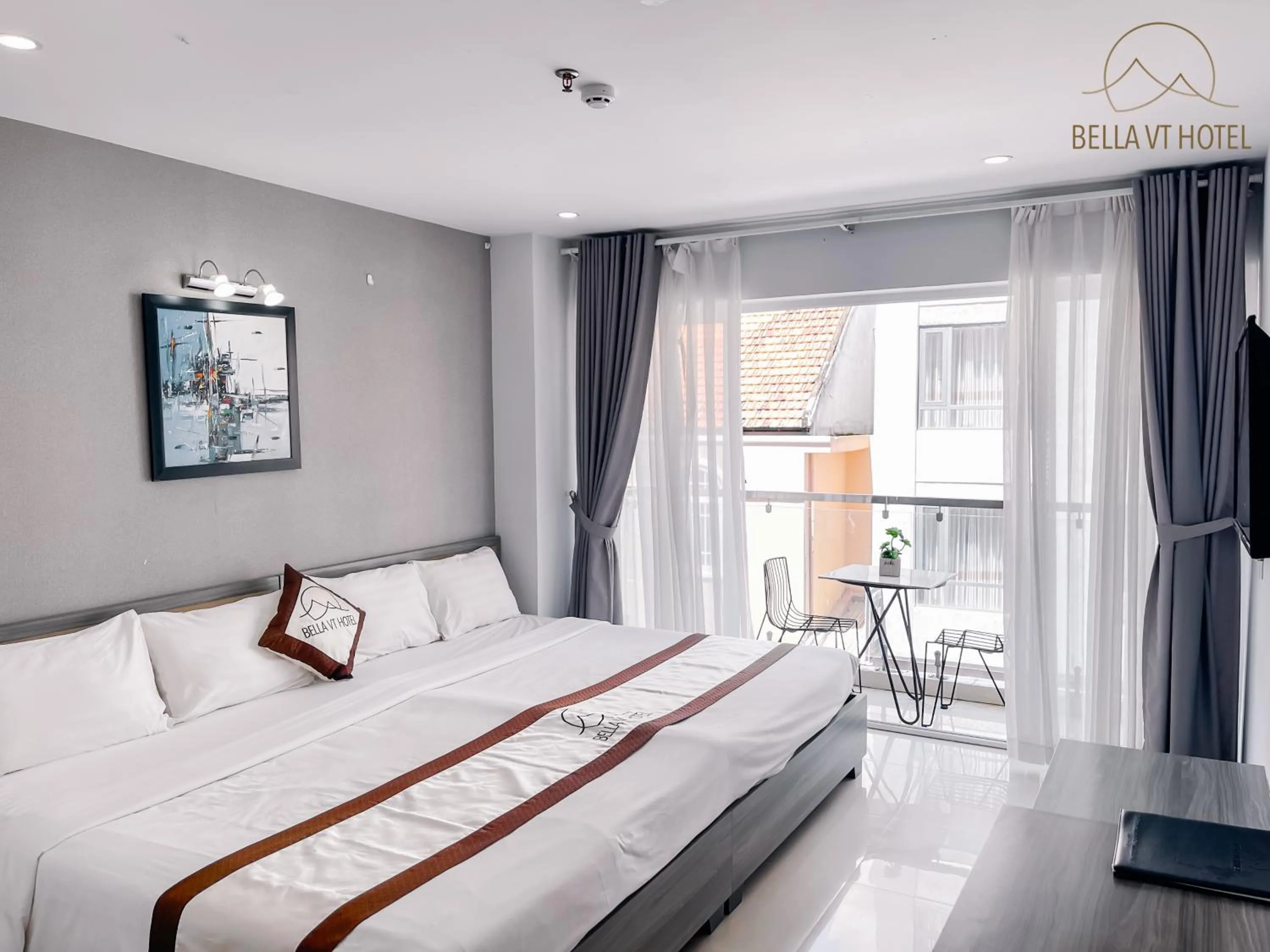 Bed in BELLA VT HOTEL