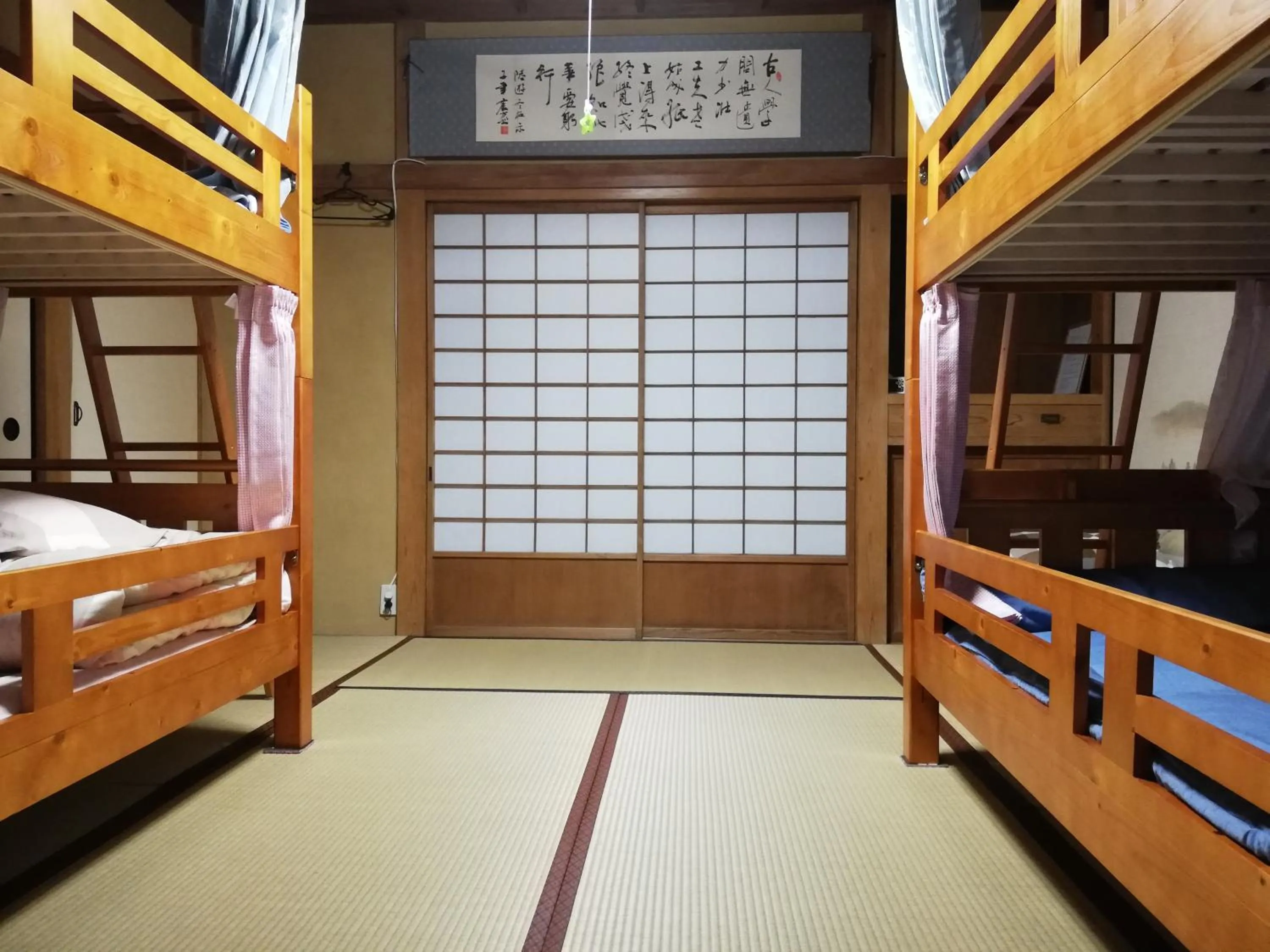 Bed in Izu Hokkawa Seaside Guesthouse 伊豆北川の家