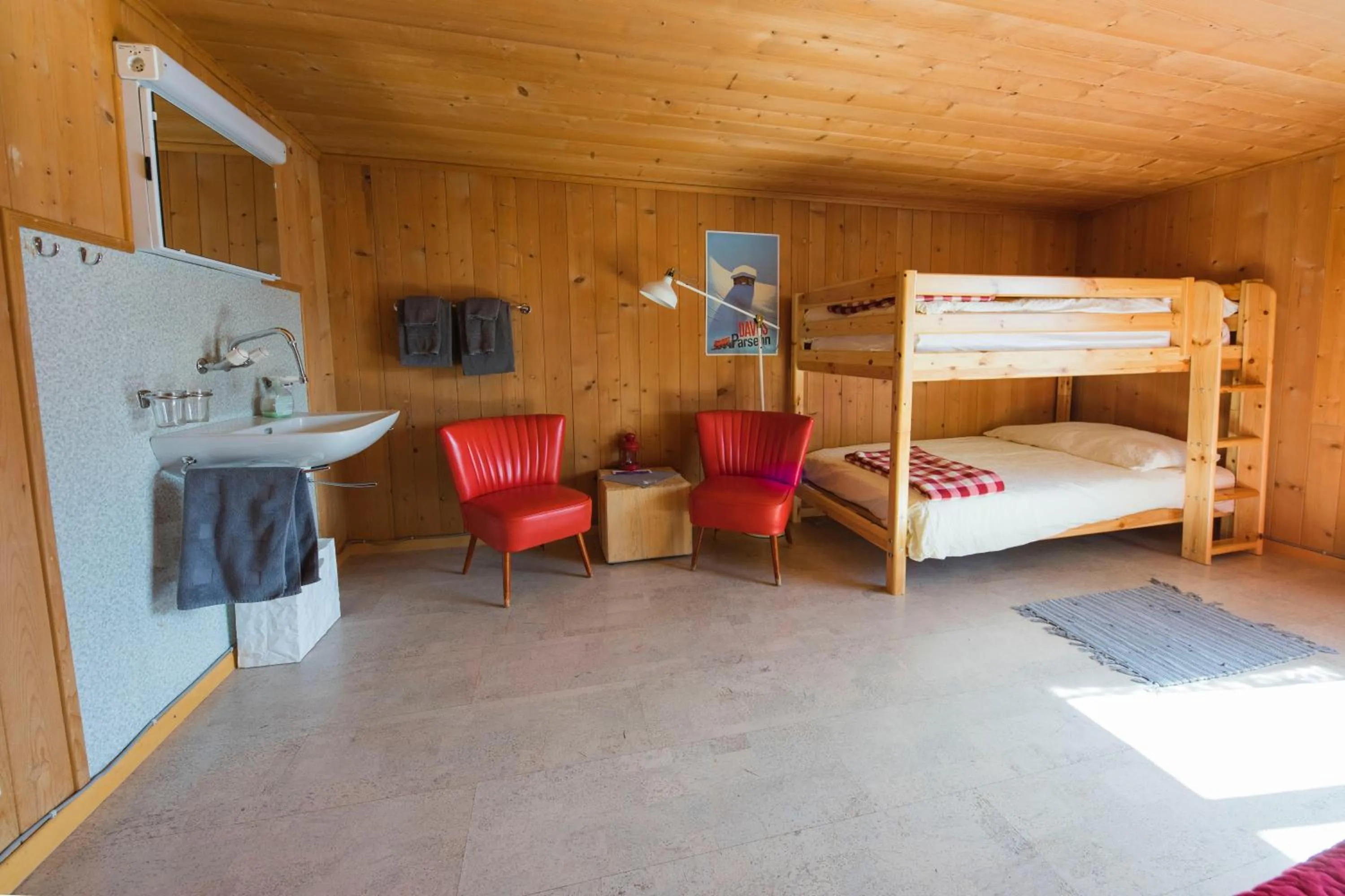 Photo of the whole room, Bed in Gästehaus Alpina in Fanas