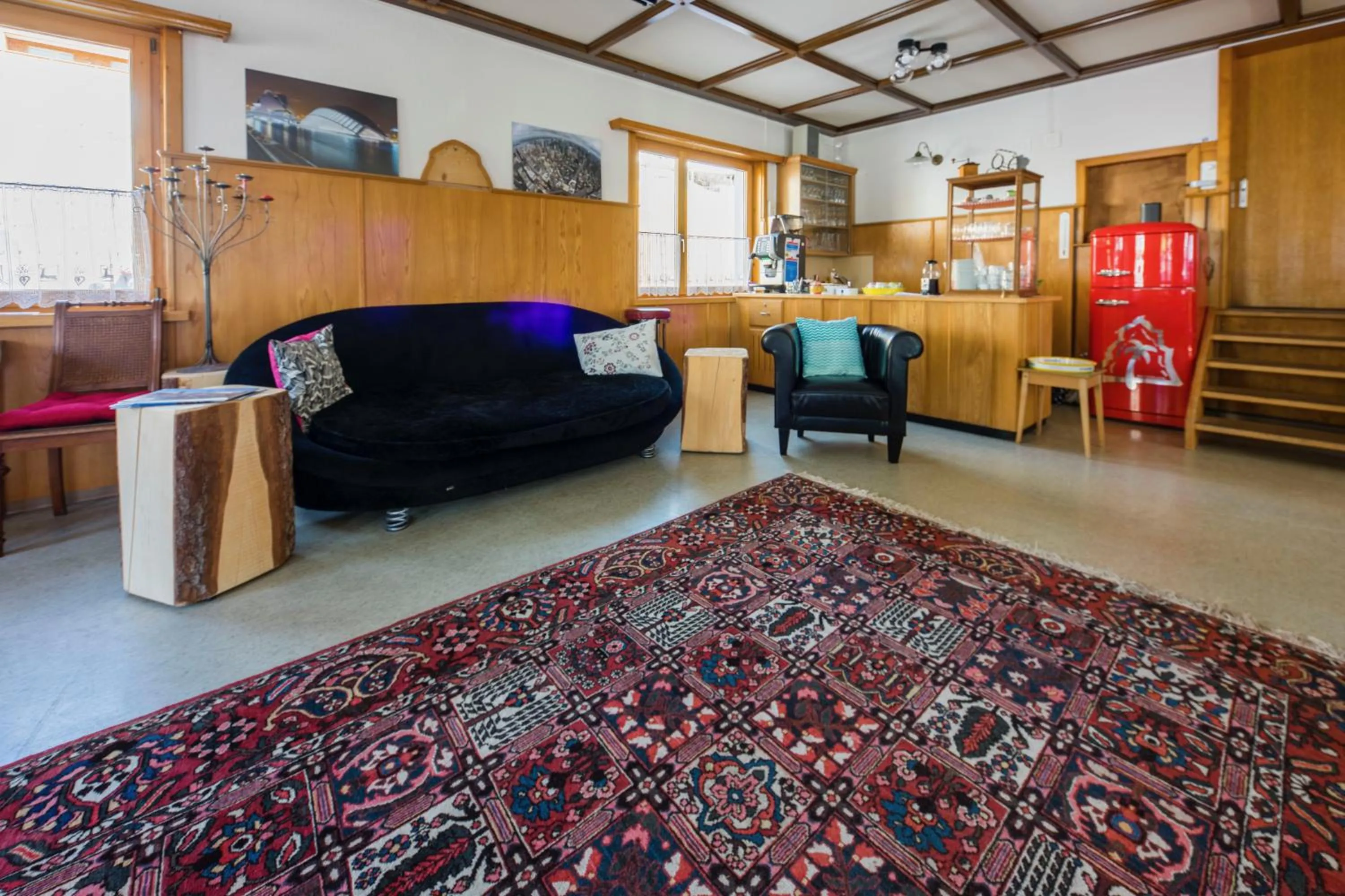 Communal lounge/ TV room in Gästehaus Alpina in Fanas