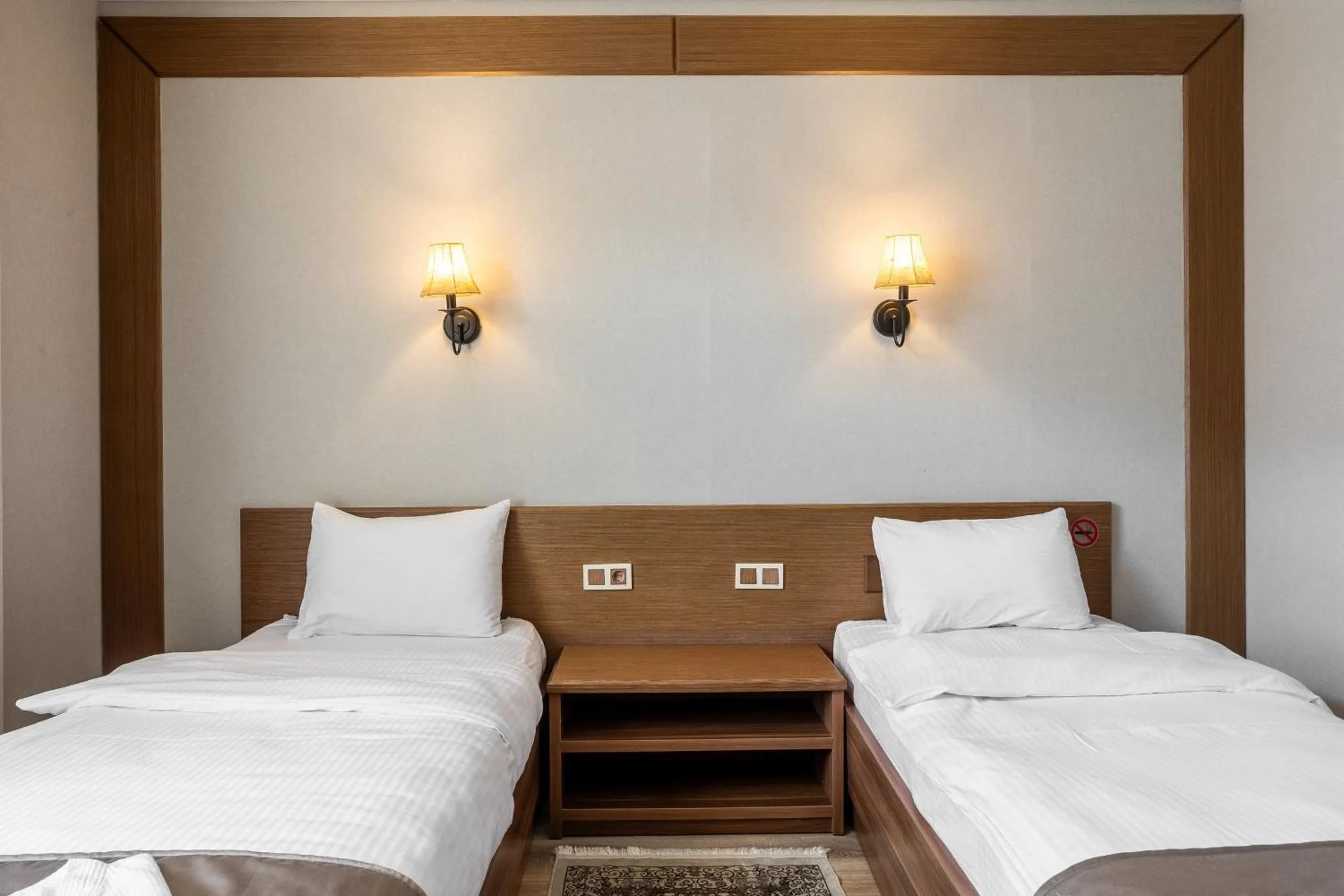 Bed in Sacvoyage Hotel