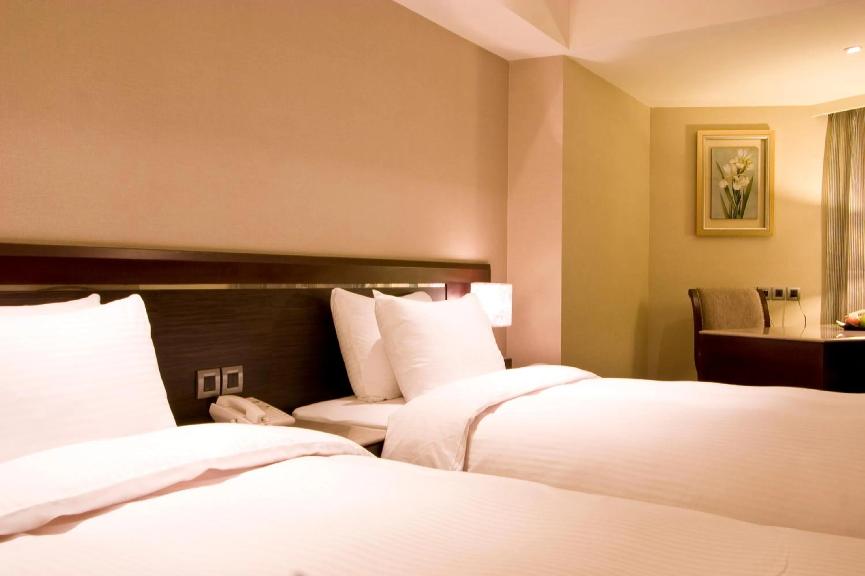 Bed in Taichung Charming City Hotel