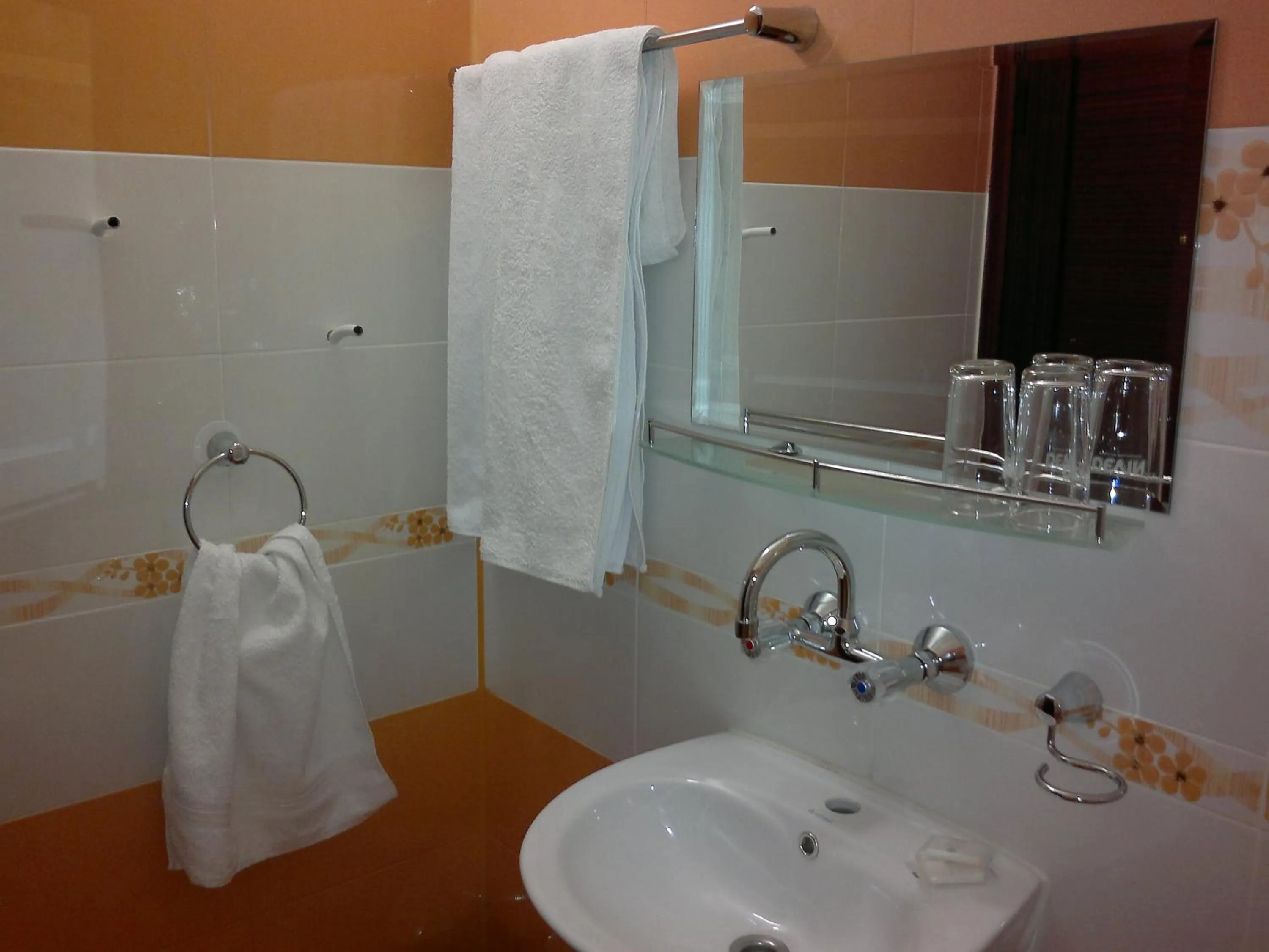 Bathroom in Family Hotel Marsina