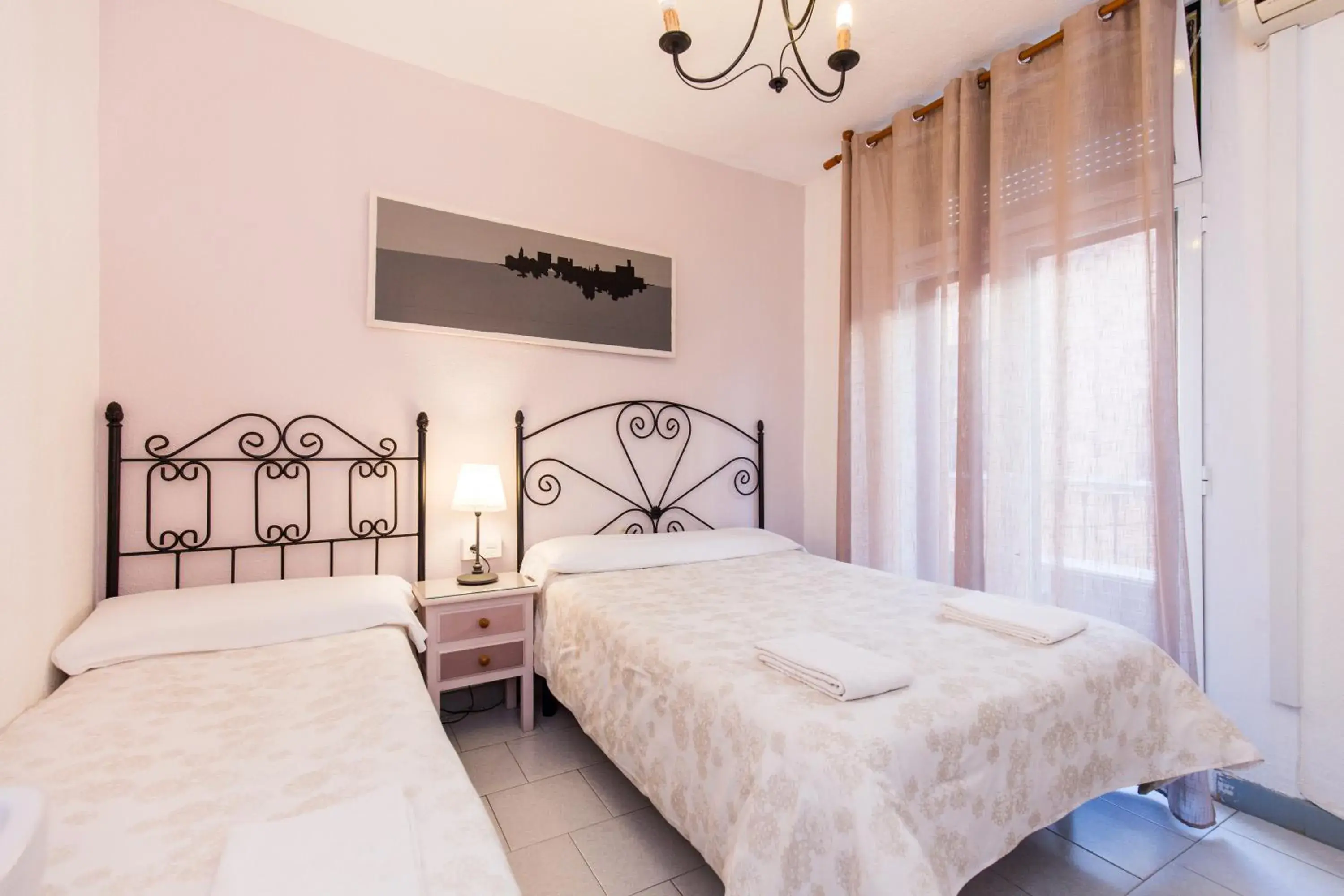 Basic Triple Room with Shared Bathroom in Pension Mesones Basic Triple Room with Shared Bathroom in Pension Mesones
