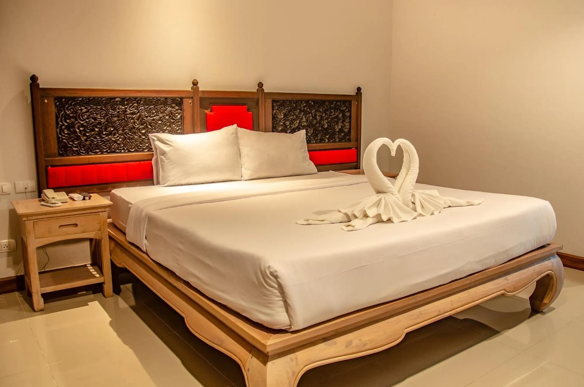 Bed in At Ruam Chok Hotel