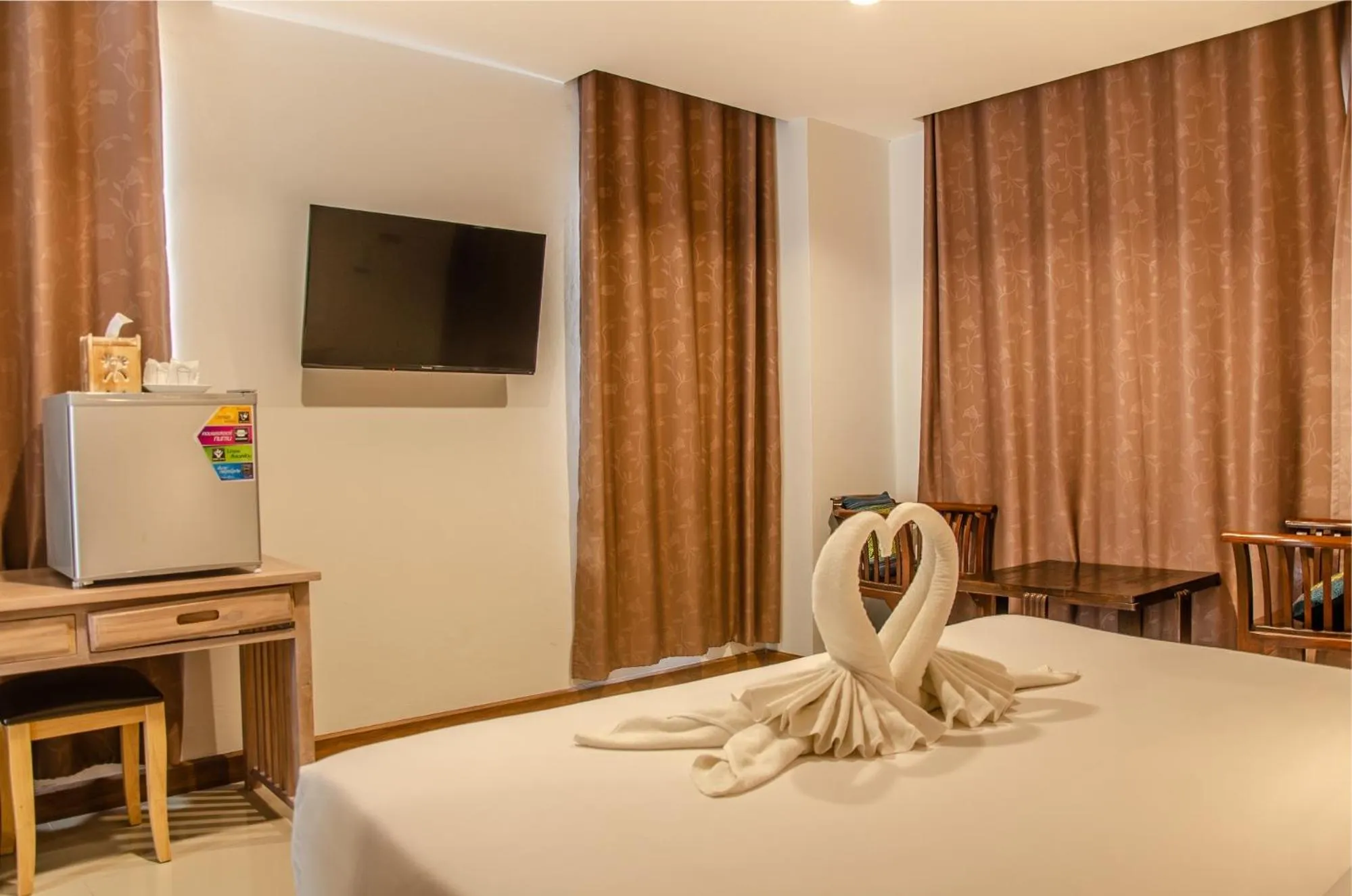 Bed in At Ruam Chok Hotel