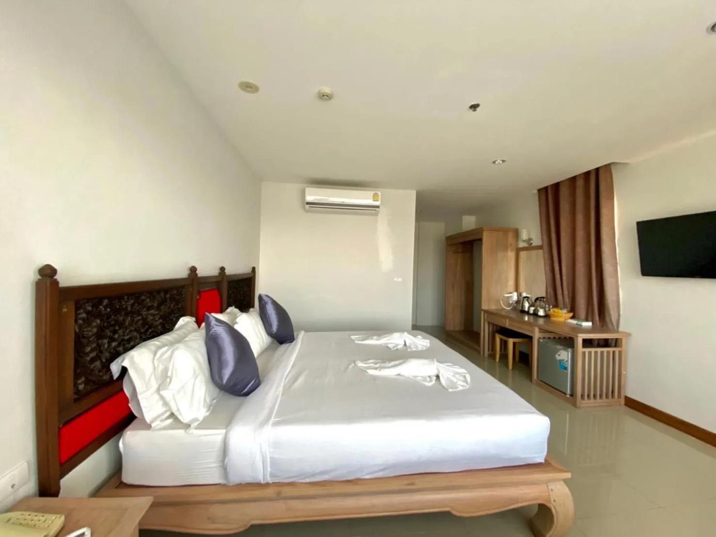 Bed in At Ruam Chok Hotel