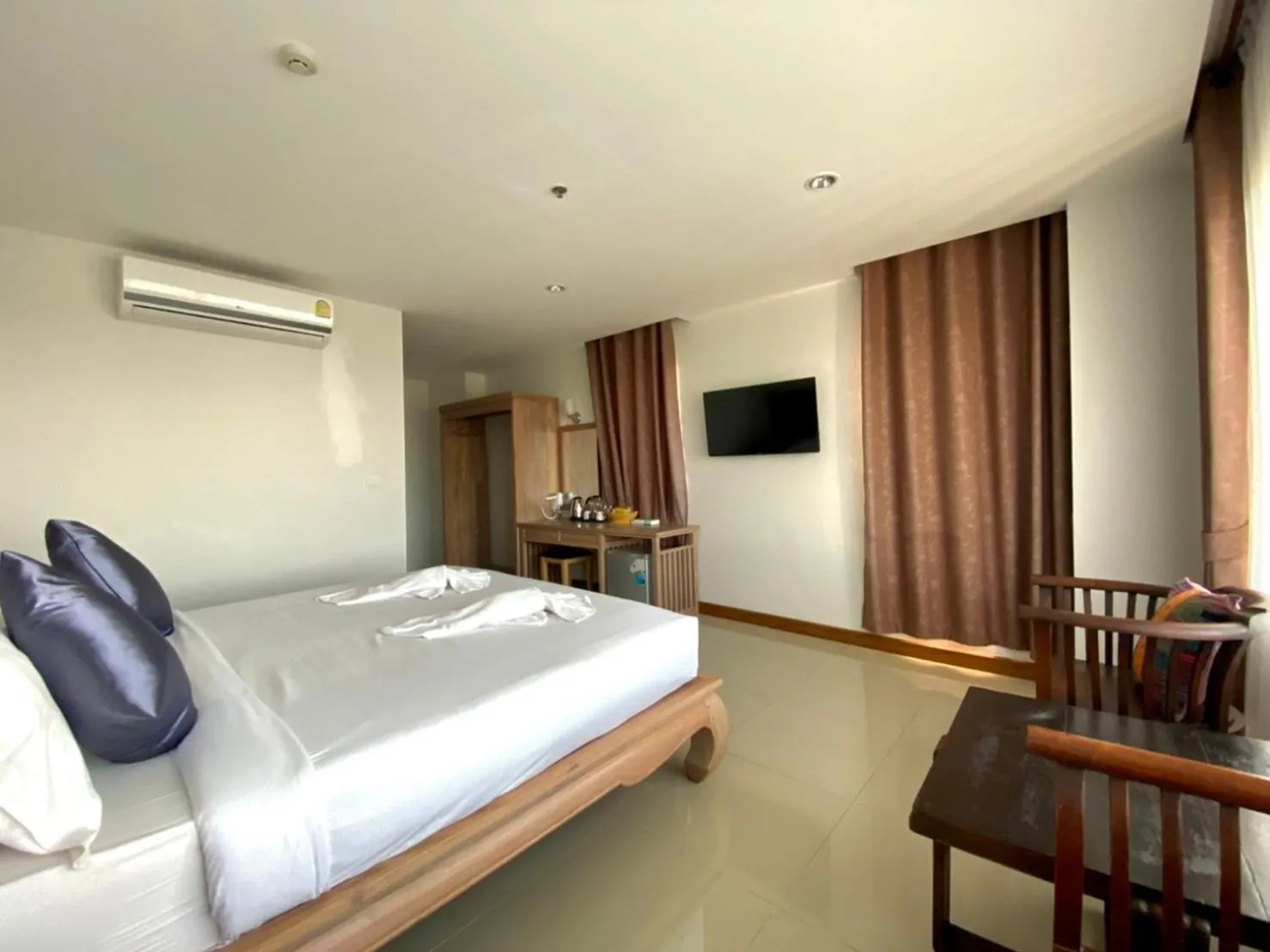 Bed in At Ruam Chok Hotel