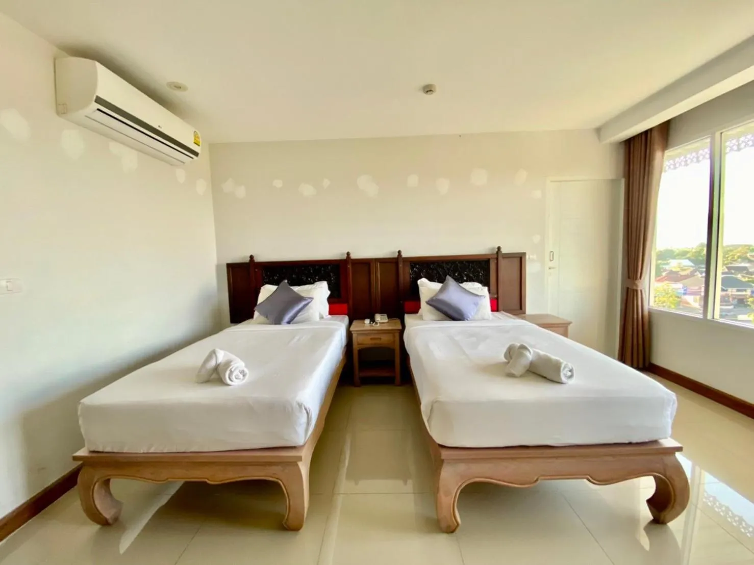 Bed in At Ruam Chok Hotel
