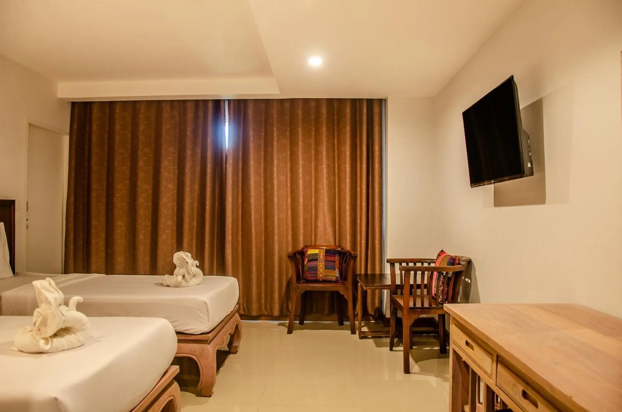 Bed in At Ruam Chok Hotel