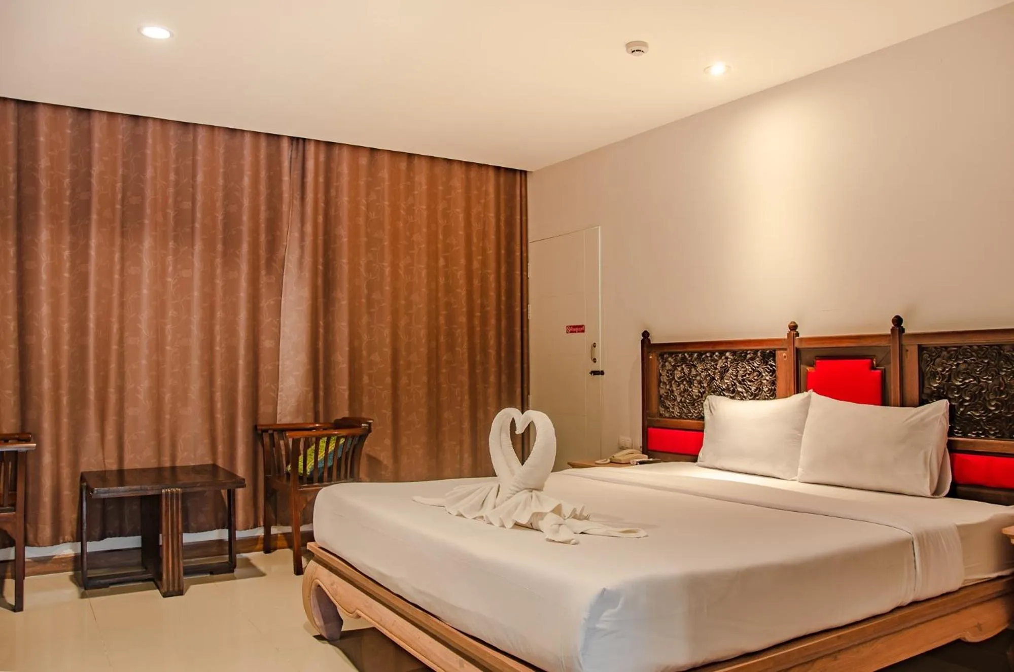 Bed in At Ruam Chok Hotel