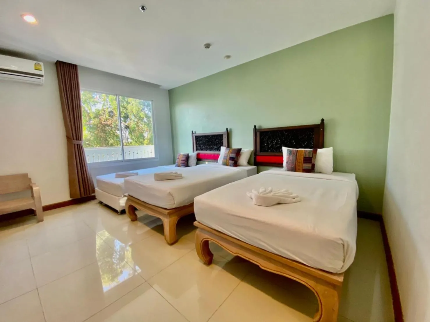 Bed in At Ruam Chok Hotel