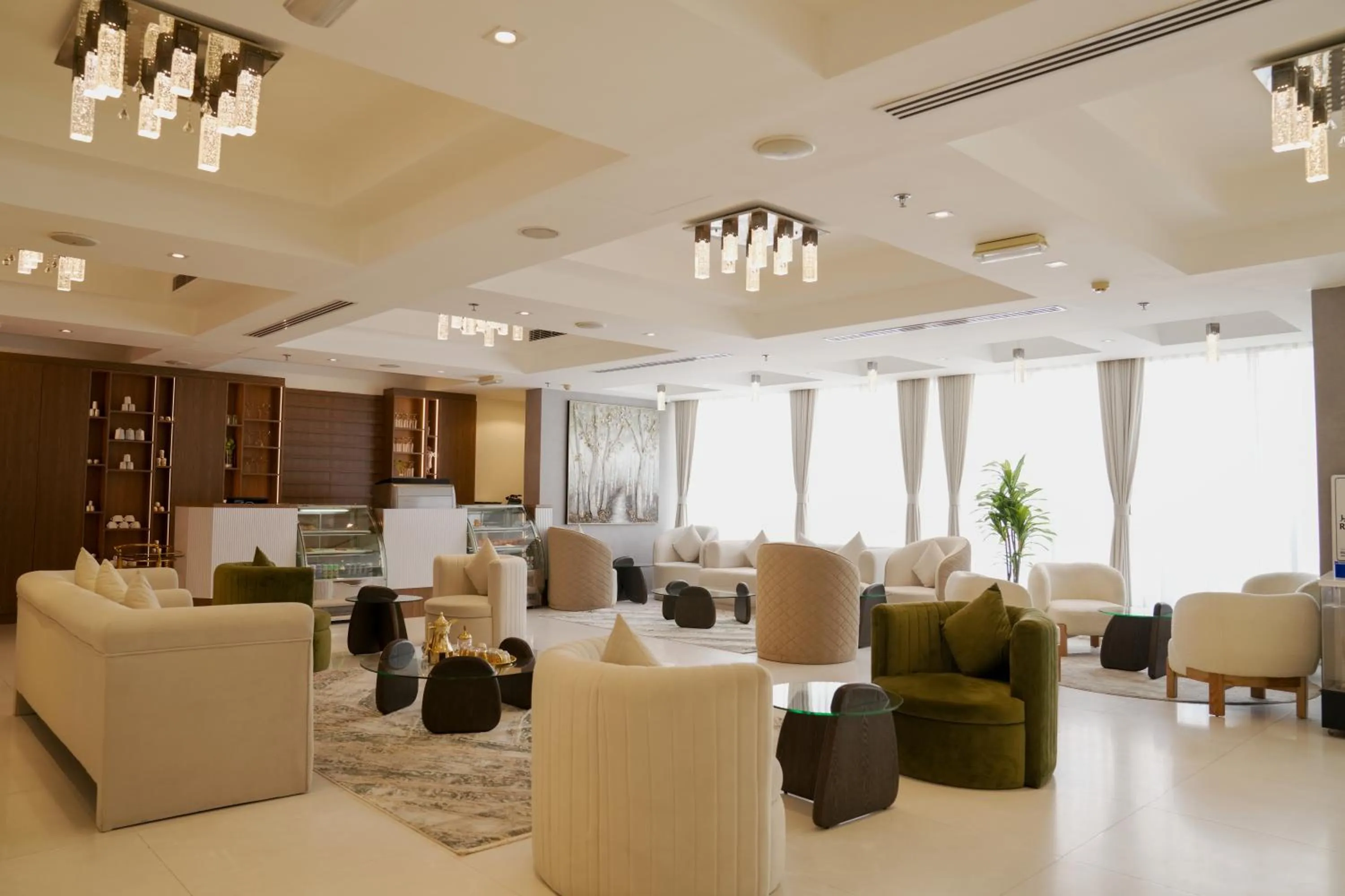 Lobby or reception in Royal Grand Suite Hotel