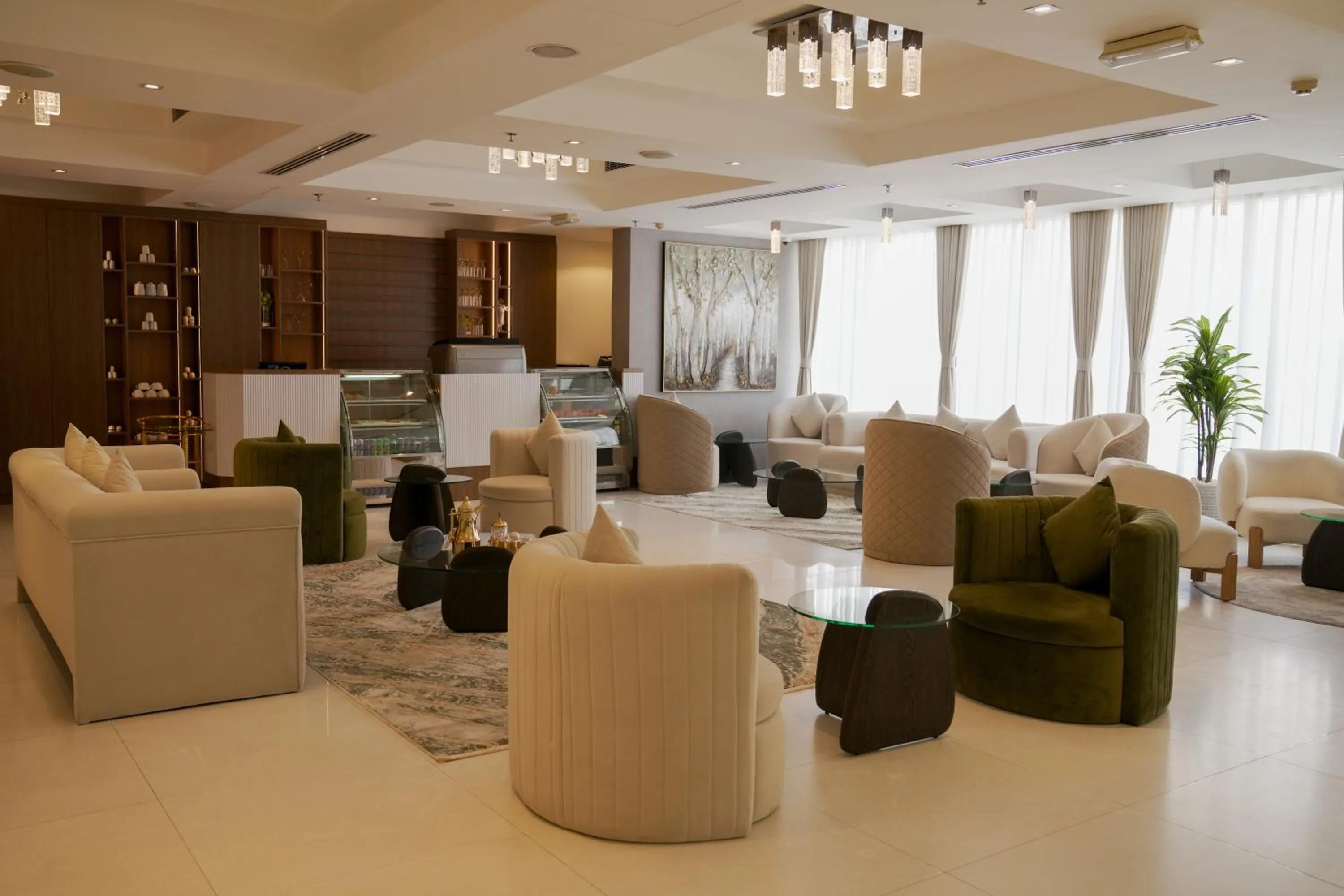 Lobby or reception in Royal Grand Suite Hotel