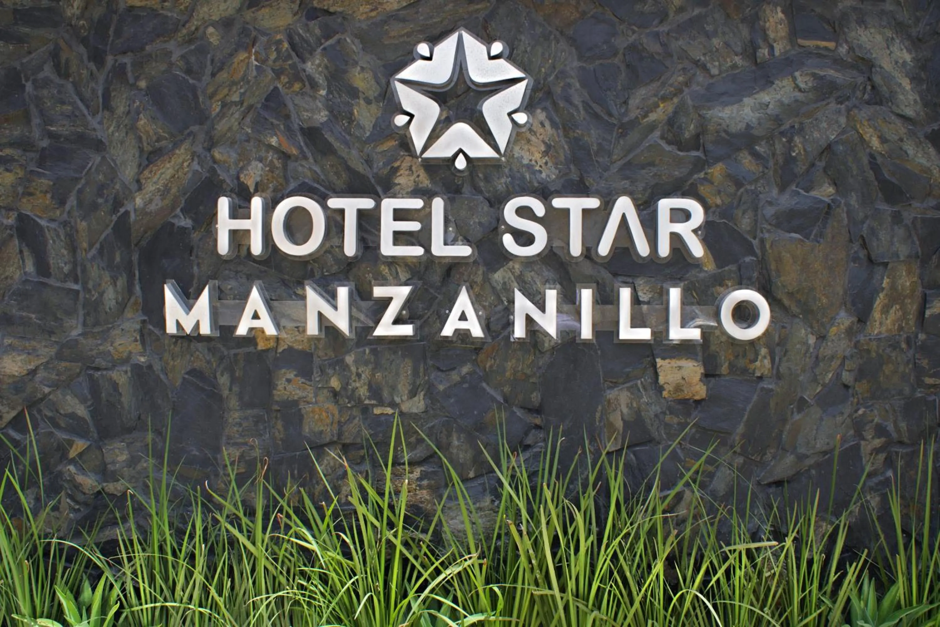 Property logo or sign in Hotel Star