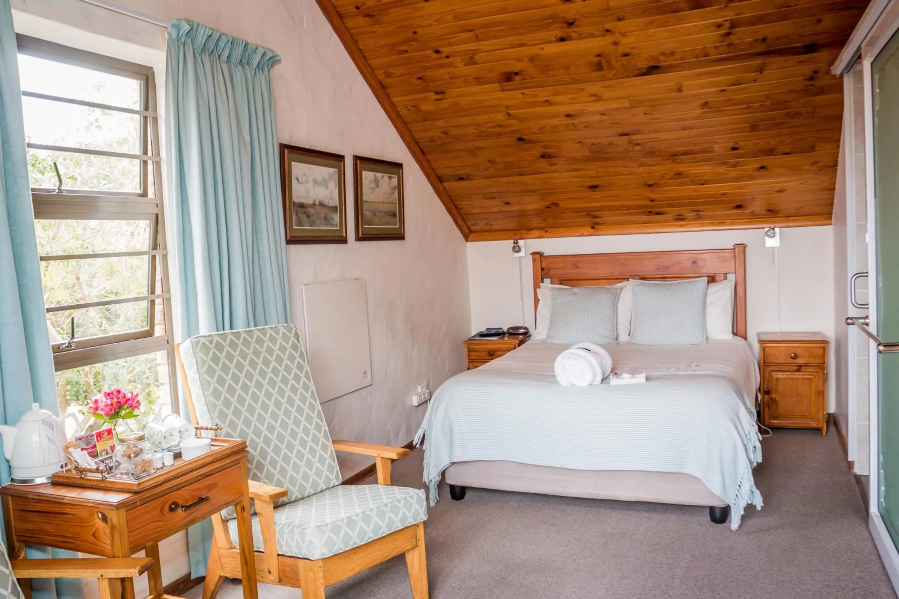 Bed in Jenny's Guest House