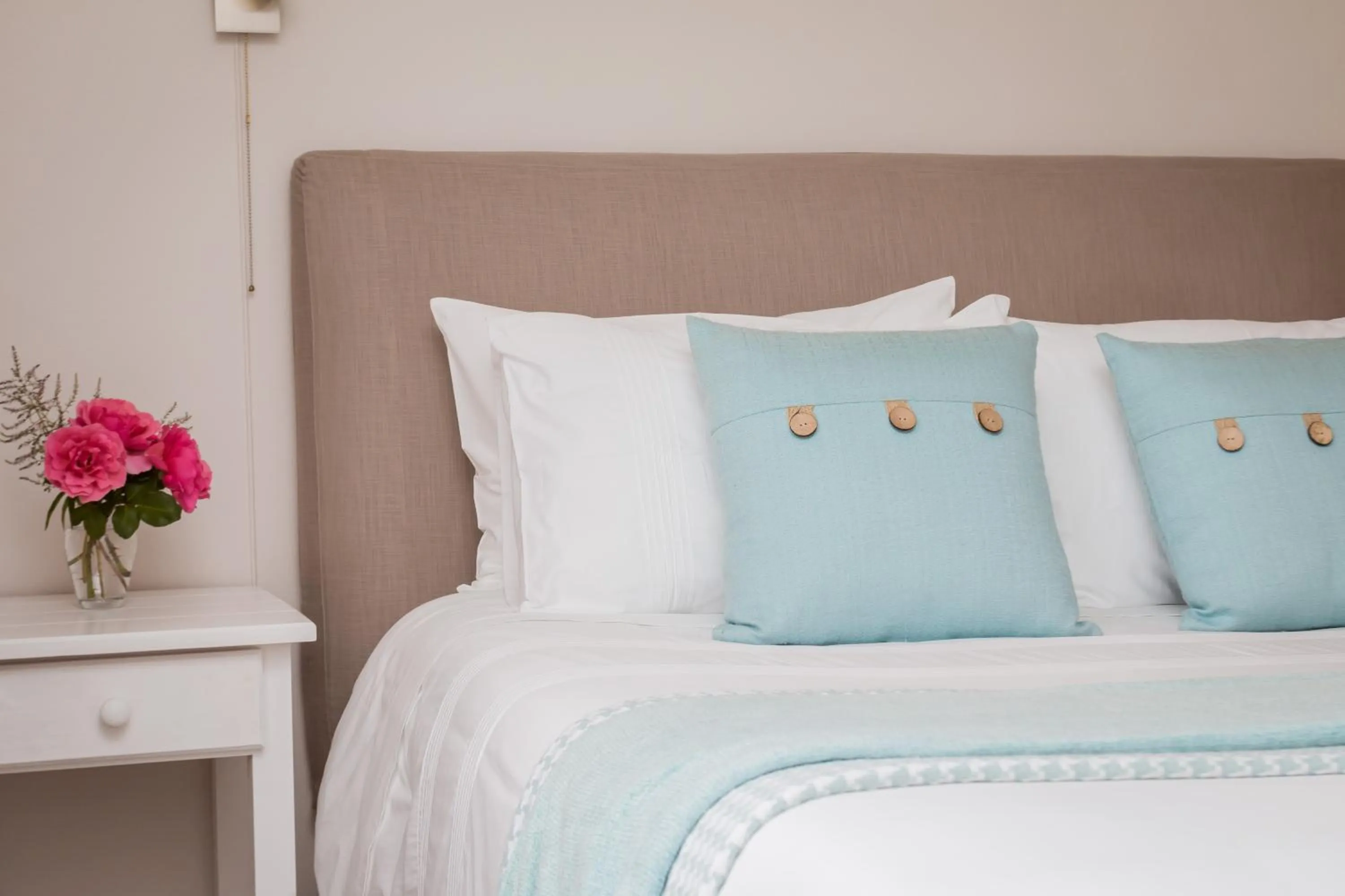 Bed in Jenny's Guest House