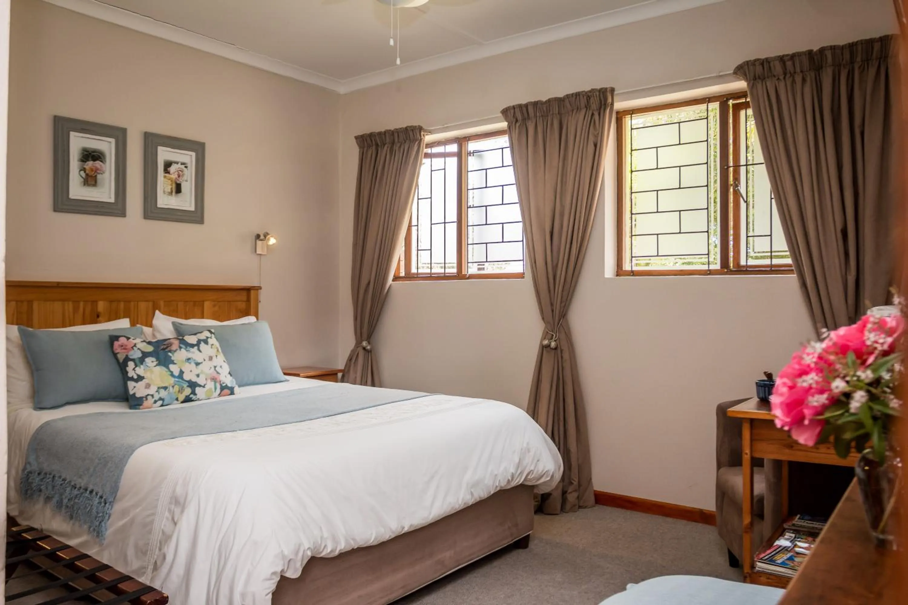 Bed in Jenny's Guest House