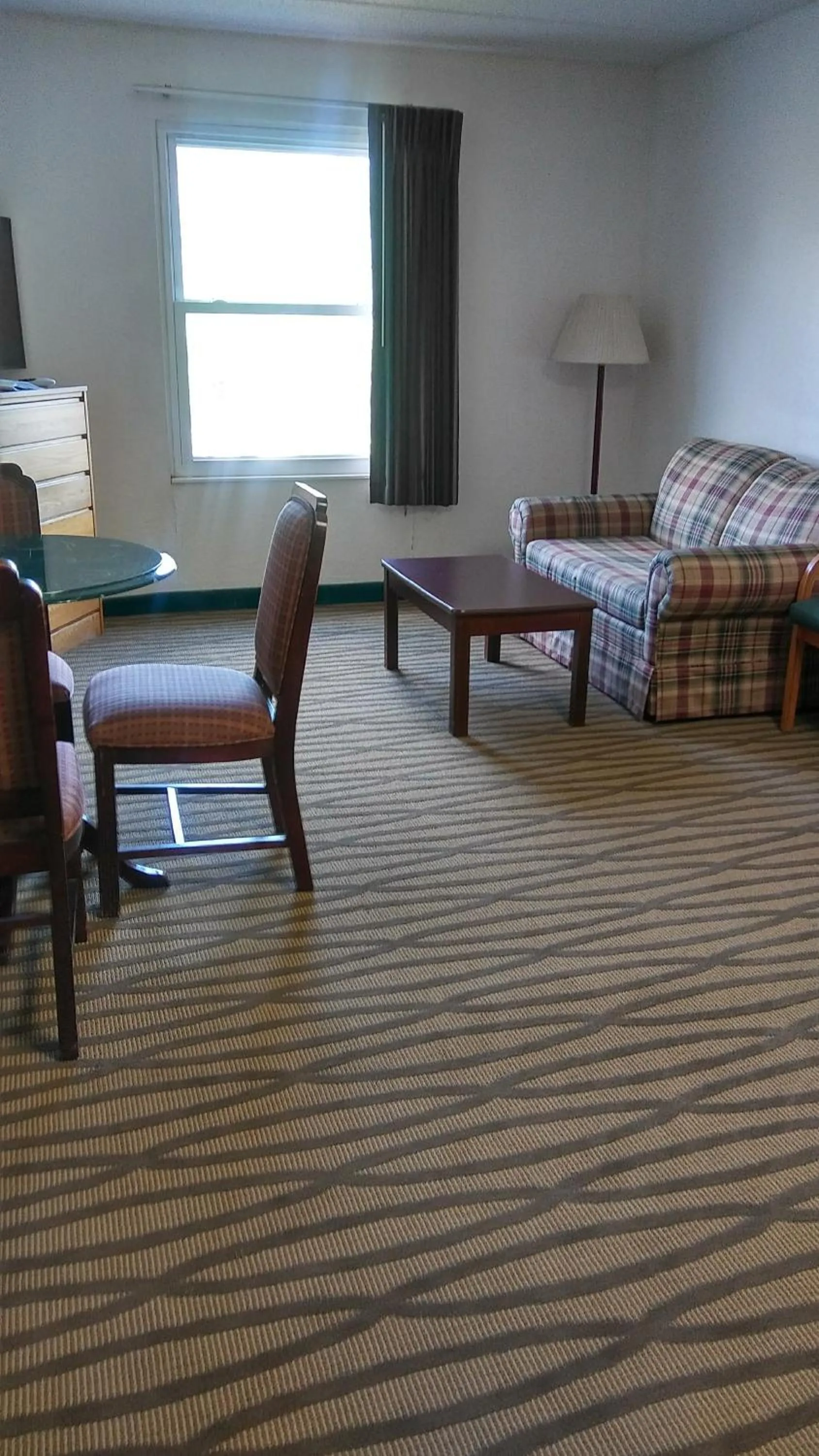 Bed in President Inn & Suites