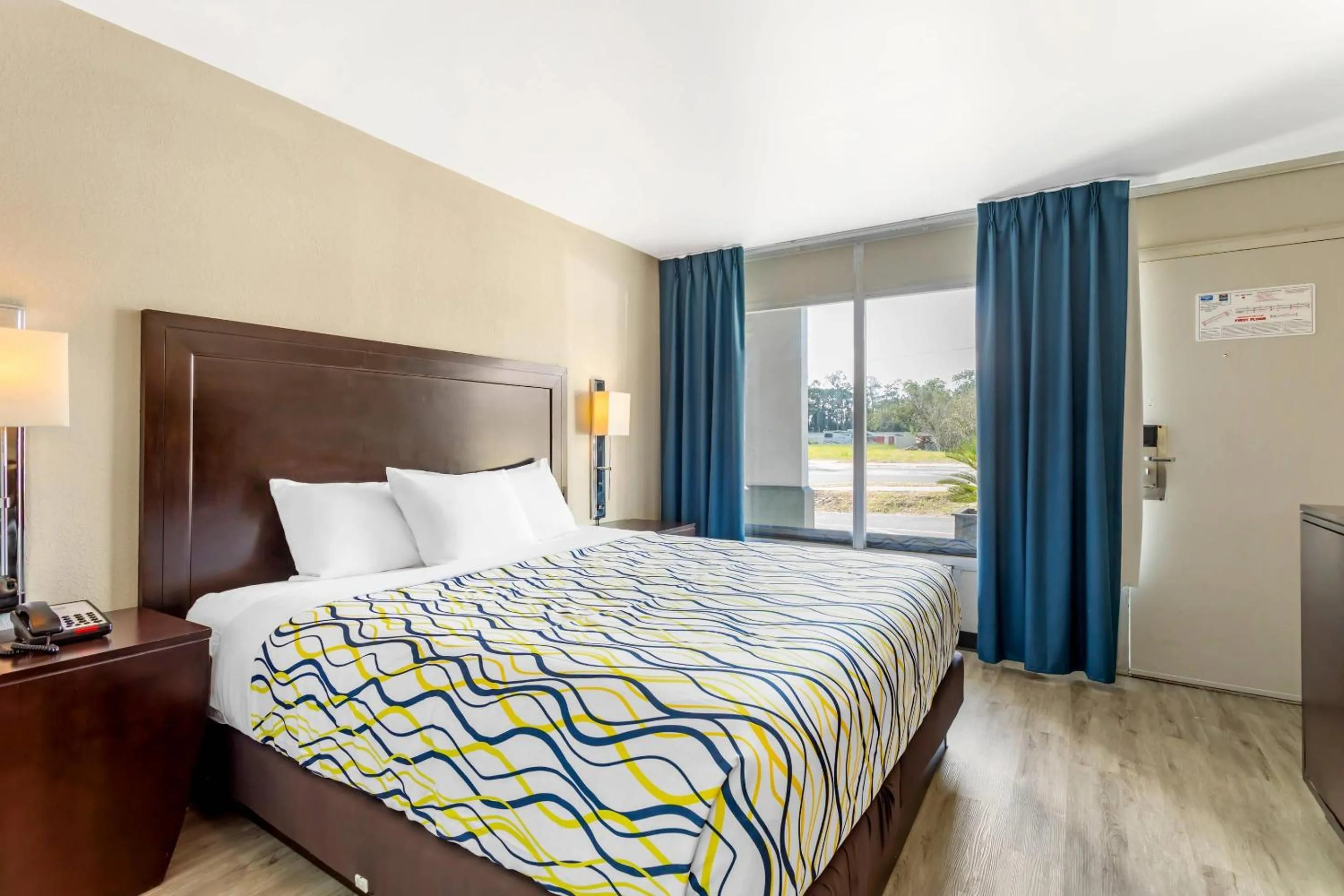 Bedroom, Bed in Rodeway Inn Orange Park - Jacksonville near Naval Air Station