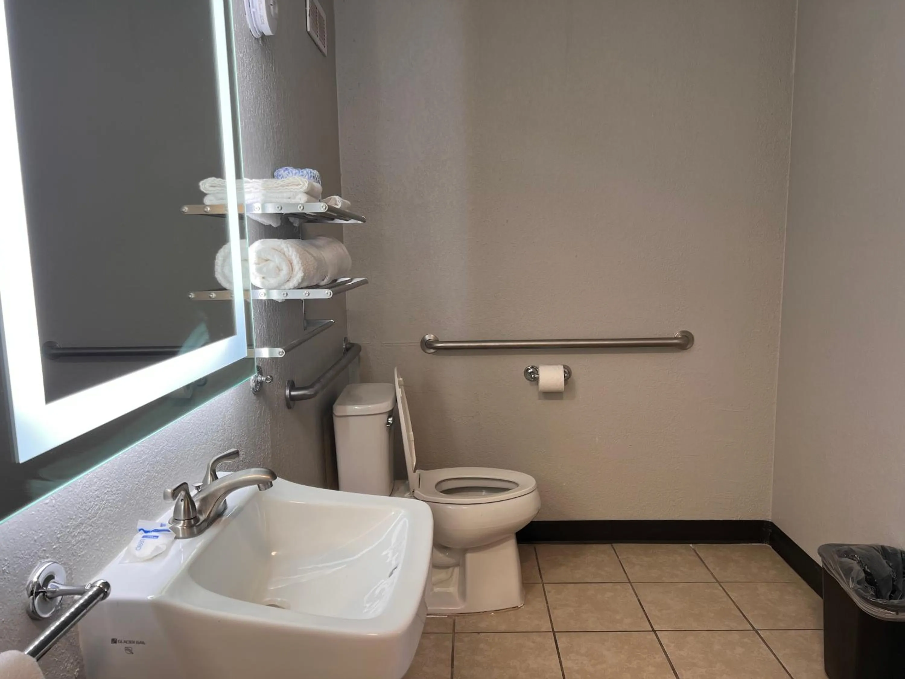 Toilet in Rodeway Inn Orange Park - Jacksonville near Naval Air Station