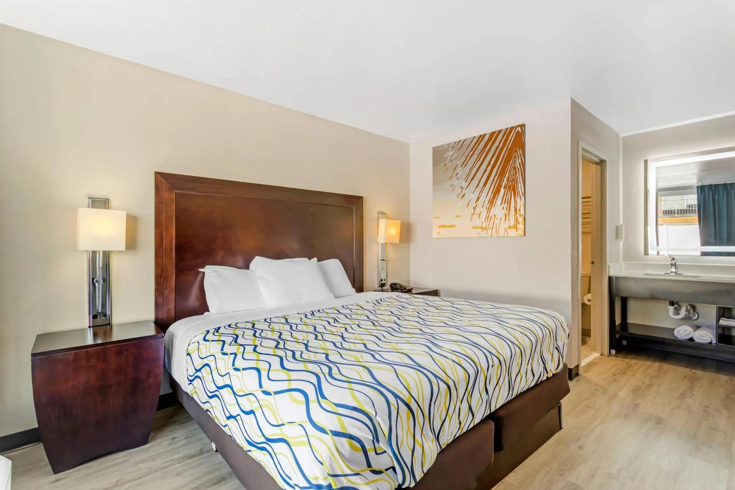 Bedroom, Bed in Rodeway Inn Orange Park - Jacksonville near Naval Air Station