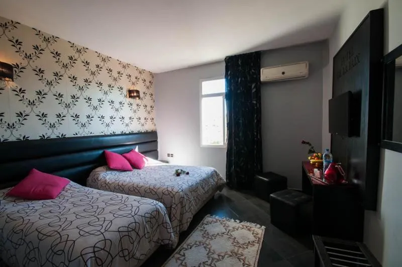 Bed in Hotel De La Paix