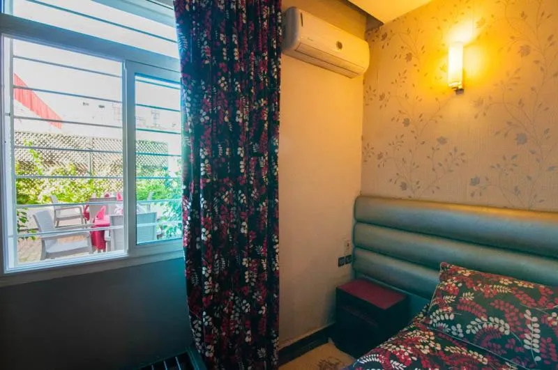 Bed in Hotel De La Paix