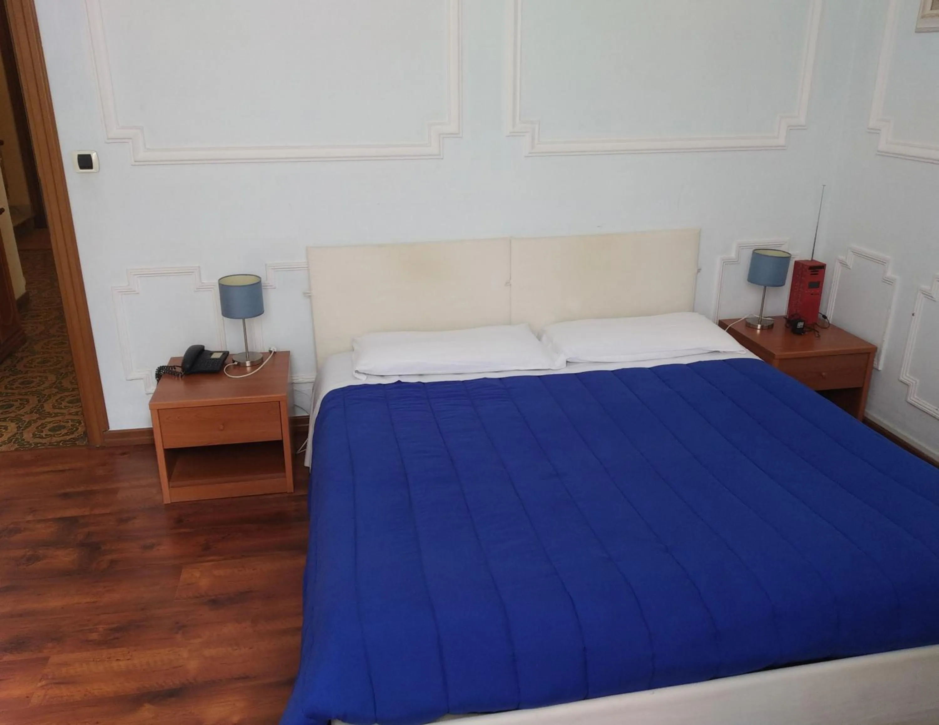 Bed in Hotel Lucciola