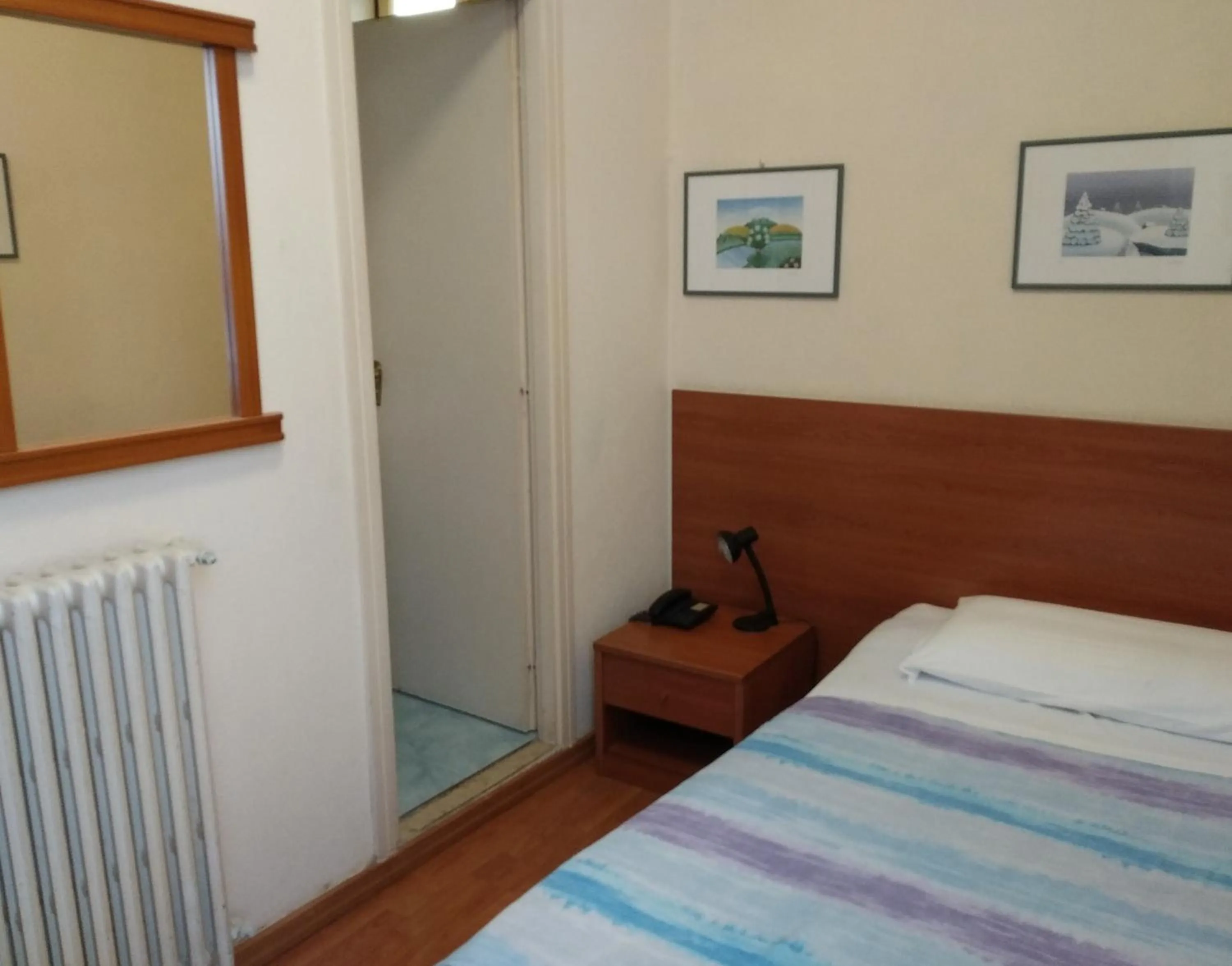 Bed in Hotel Lucciola