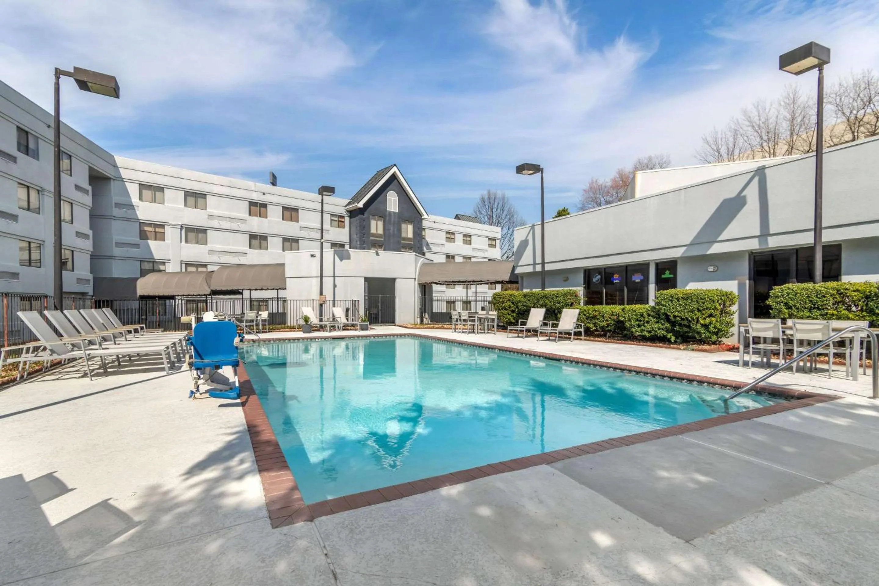 Swimming pool in Country Inn & Suites by Radisson, Atlanta Airport South, GA