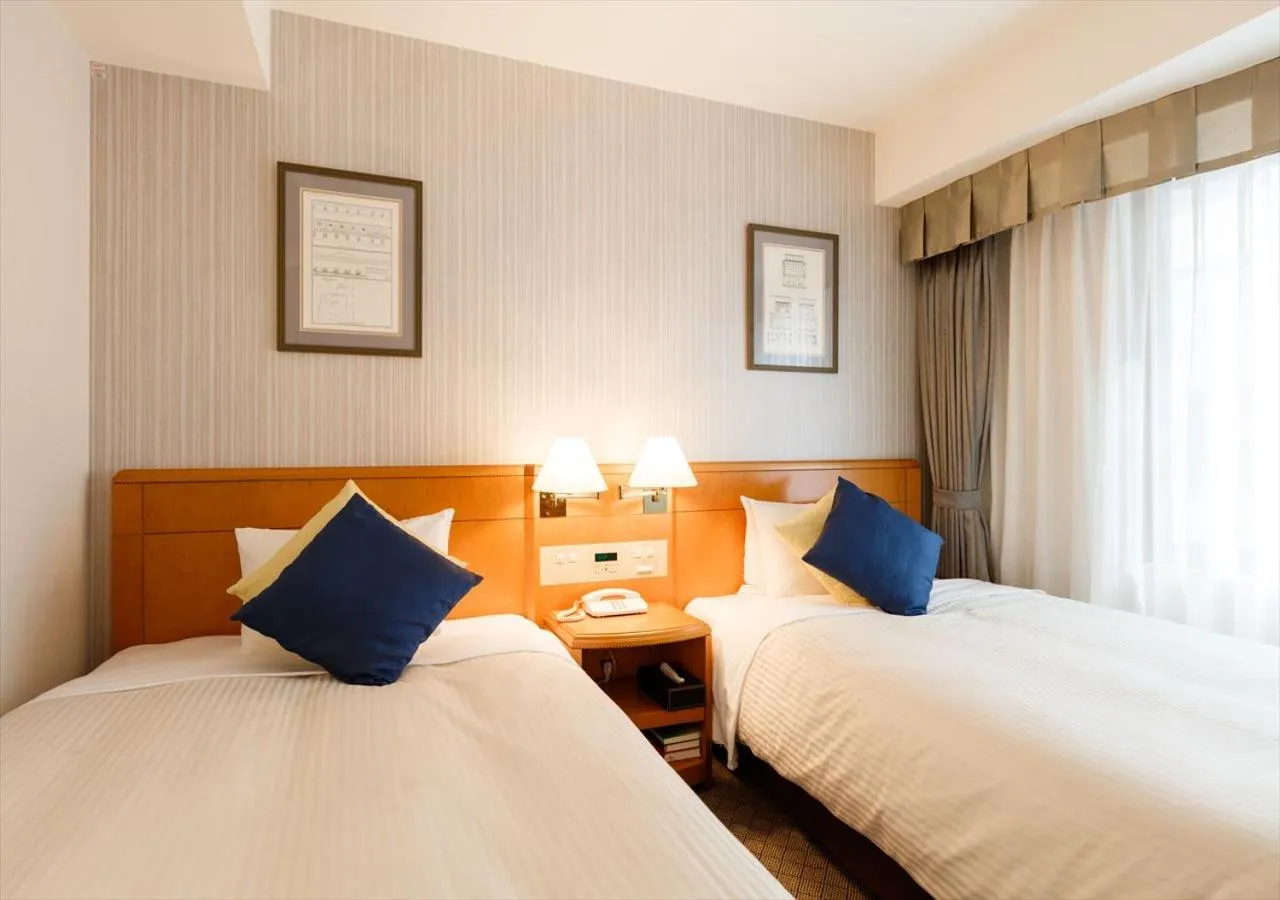 Bed in Kanazawa New Grand Hotel Premier