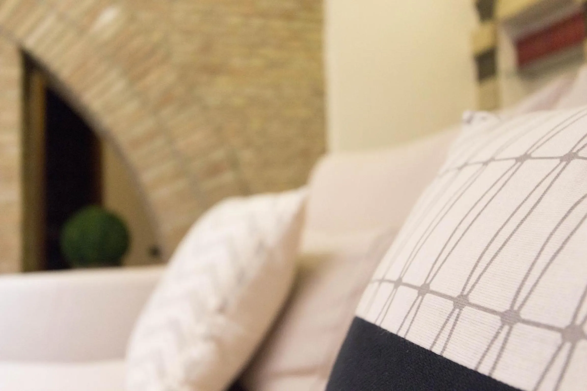 Bed in Arcobaleno Rooms