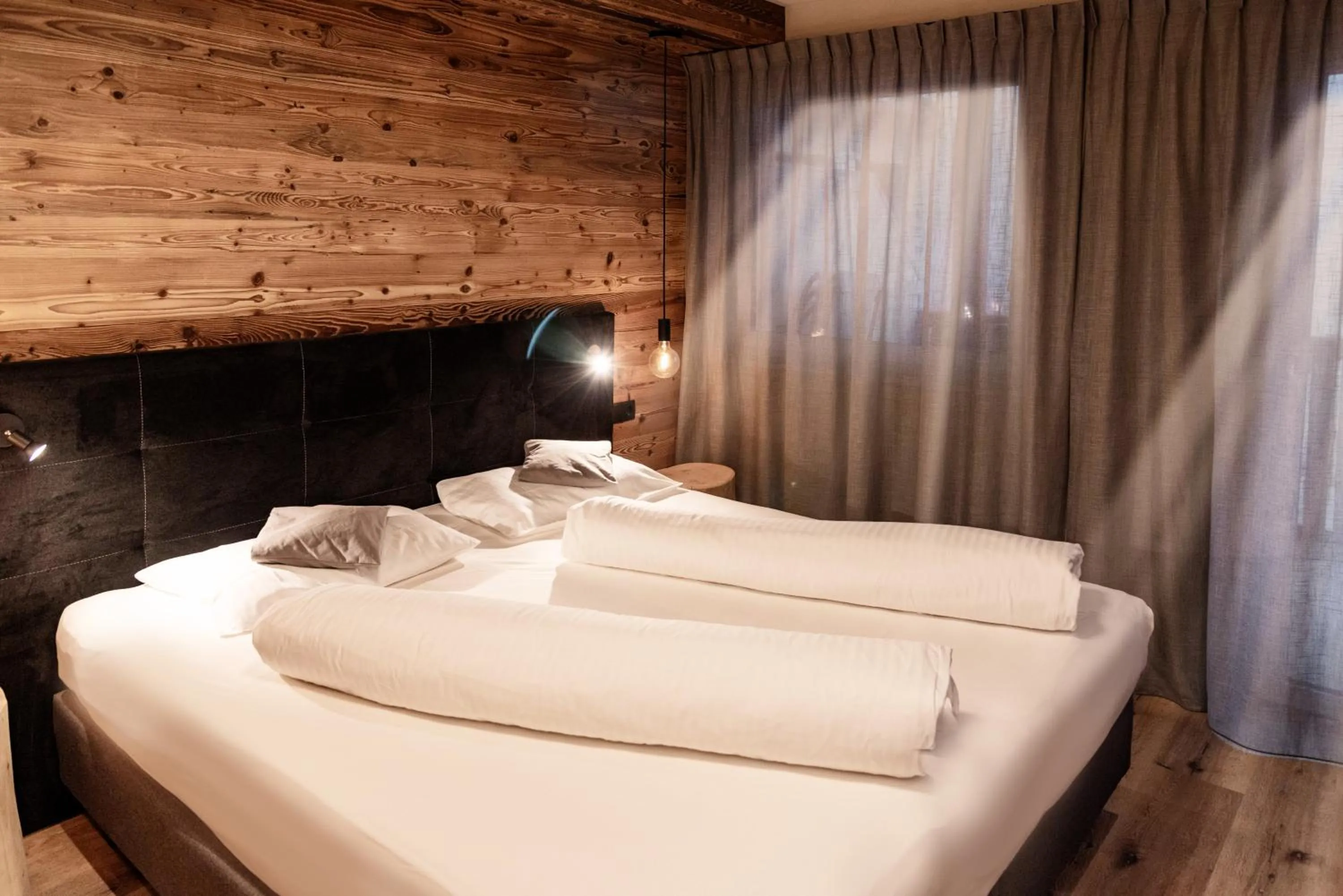 Photo of the whole room, Bed in Appartement- und Wellnesshotel Winkler