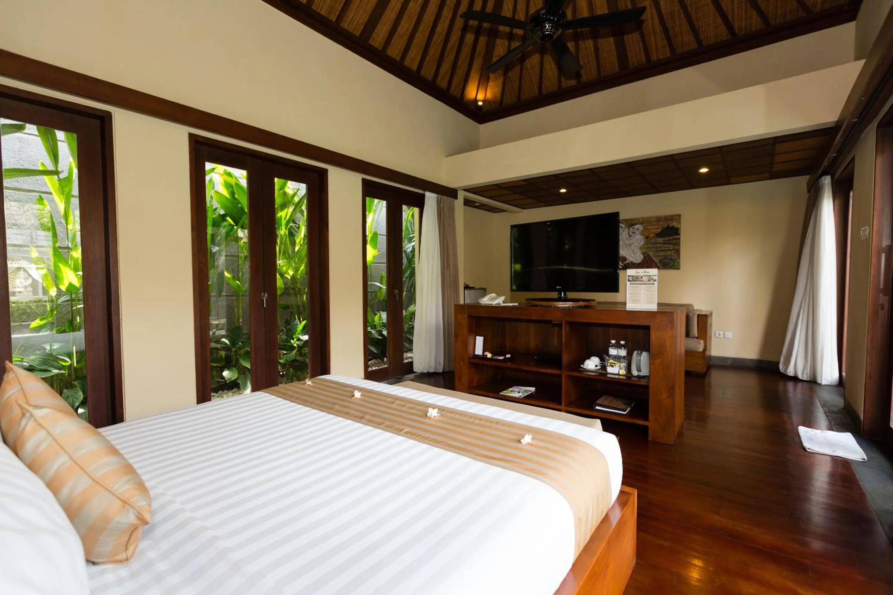 Bed in Nyuh Bali Villas