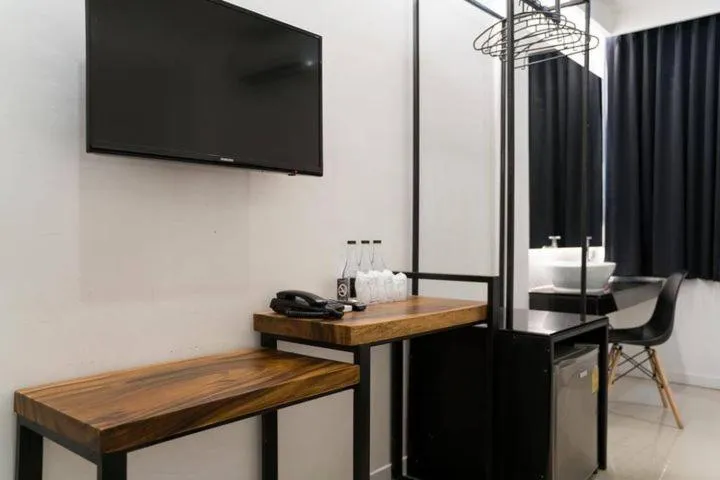 Bedroom in The Nimman Hotel - SHA Plus