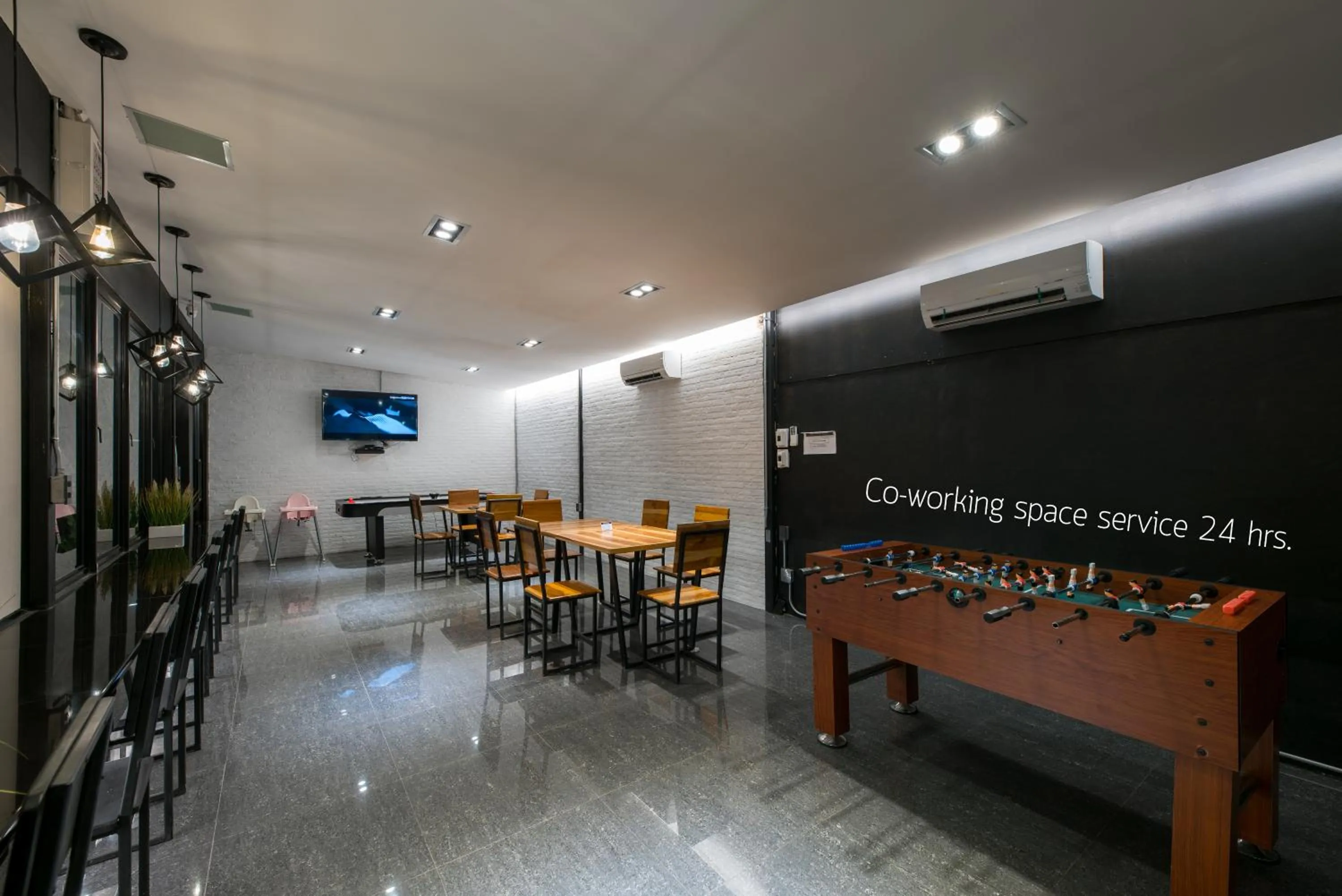 Communal lounge/ TV room in The Nimman Hotel - SHA Plus