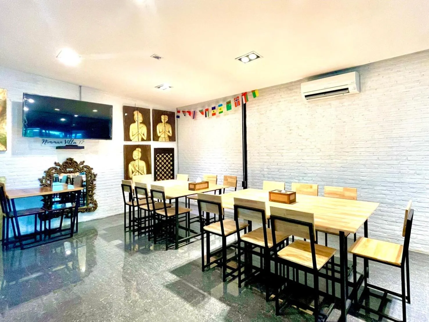 Communal lounge/ TV room in The Nimman Hotel - SHA Plus