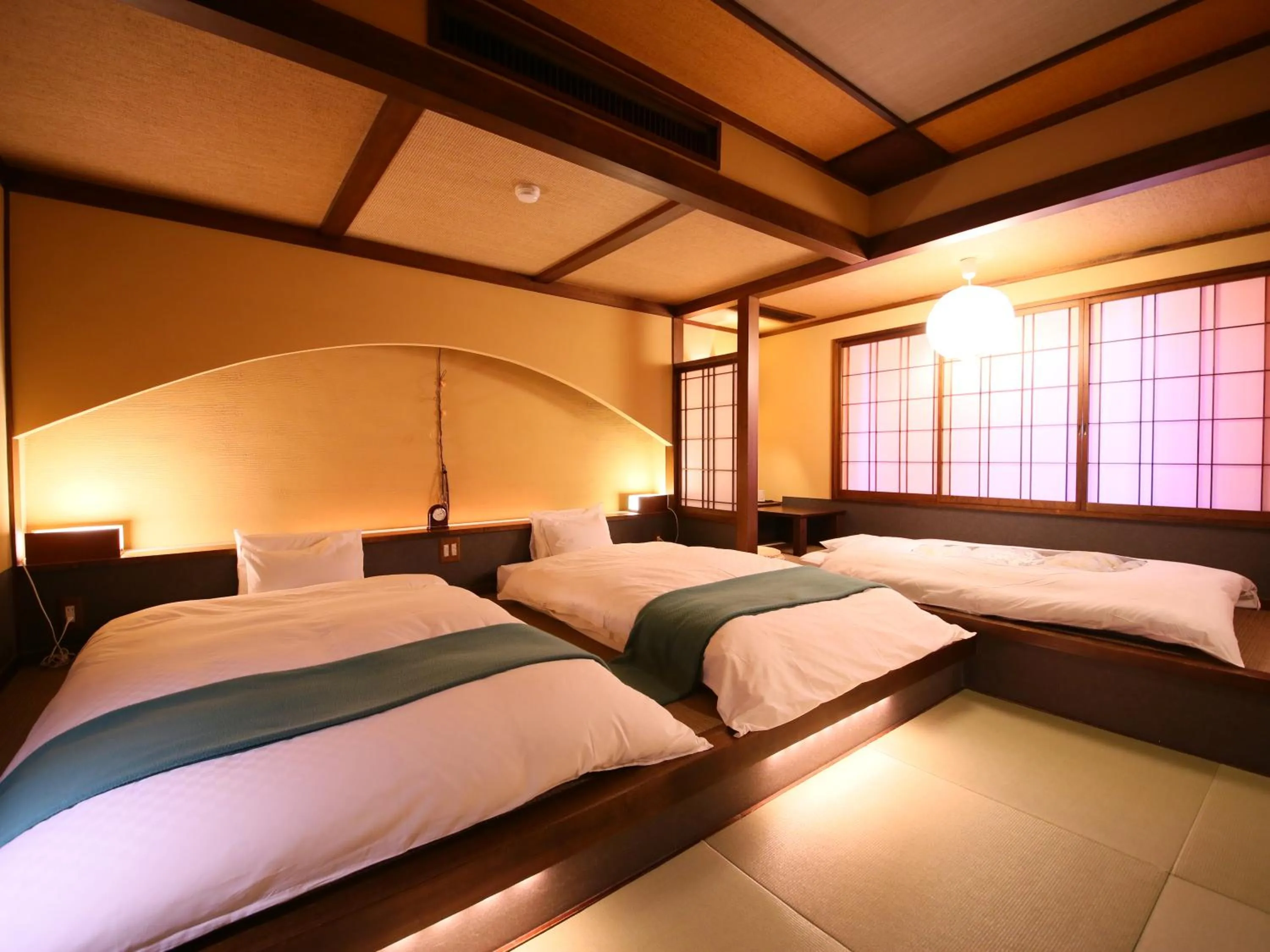 Bed in Hotel Tamanoyu
