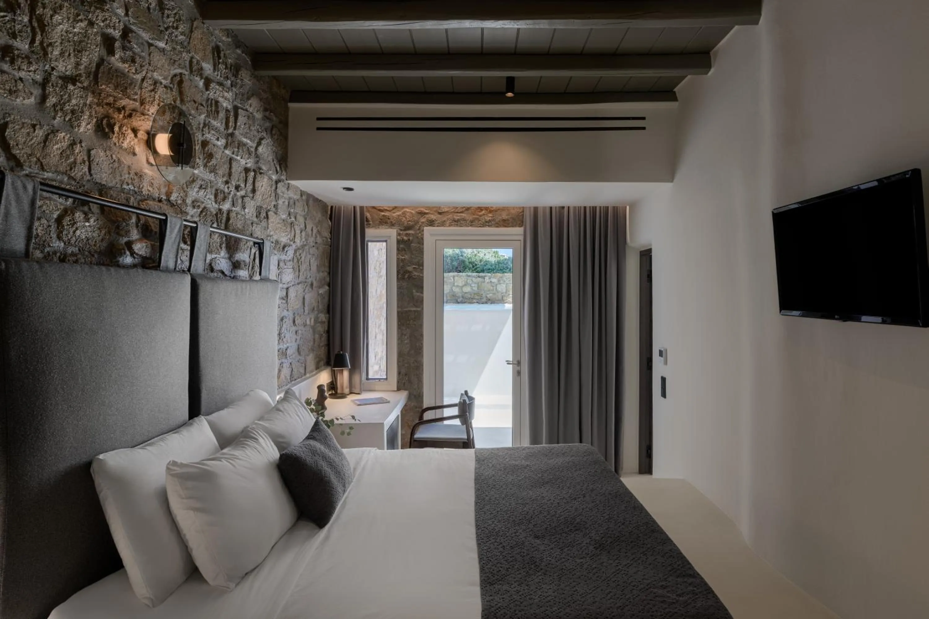 Bed in Rocabella Mykonos Hotel