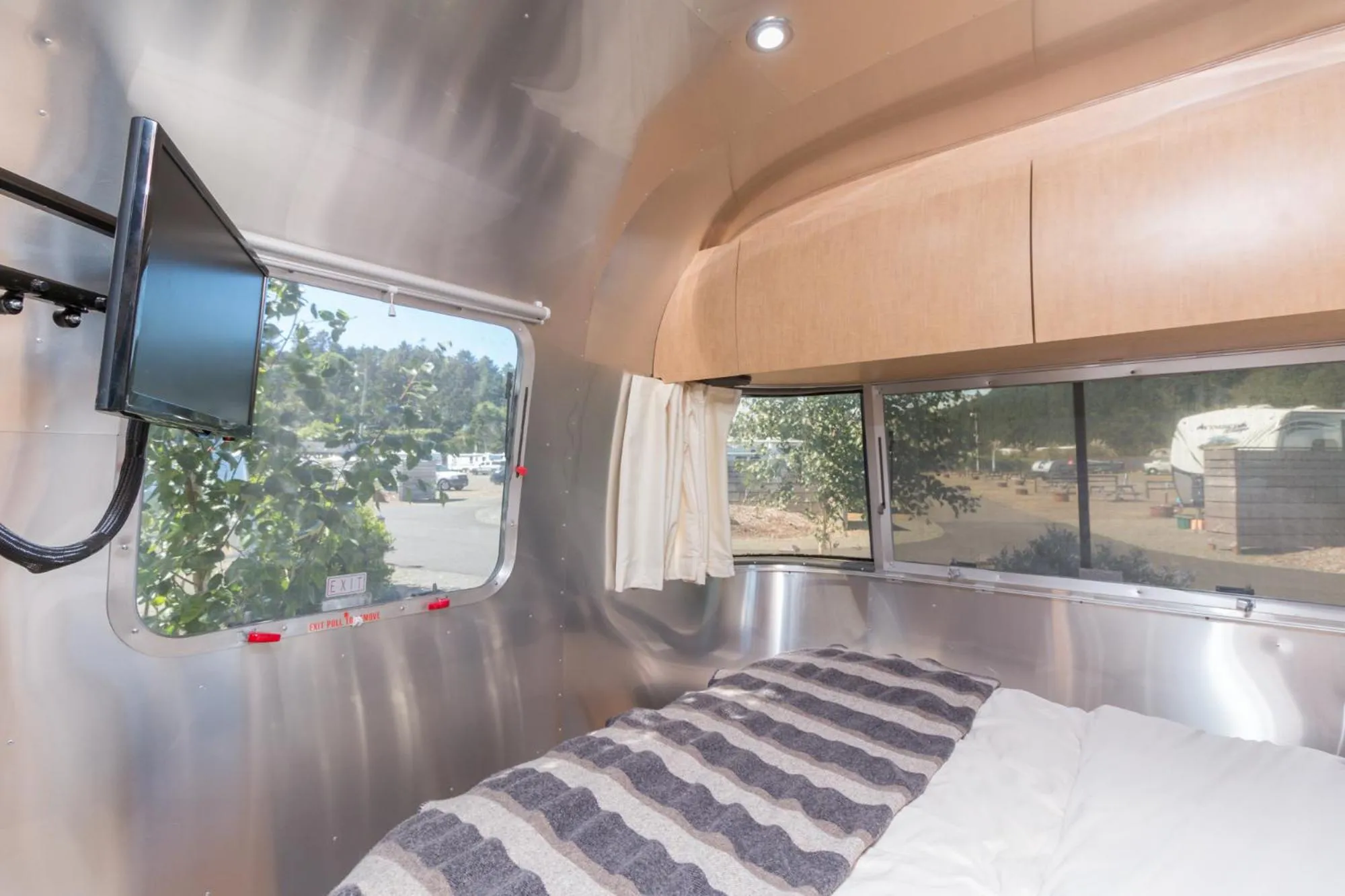 Bed in Hart’s Camp Airstream Hotel & RV Park