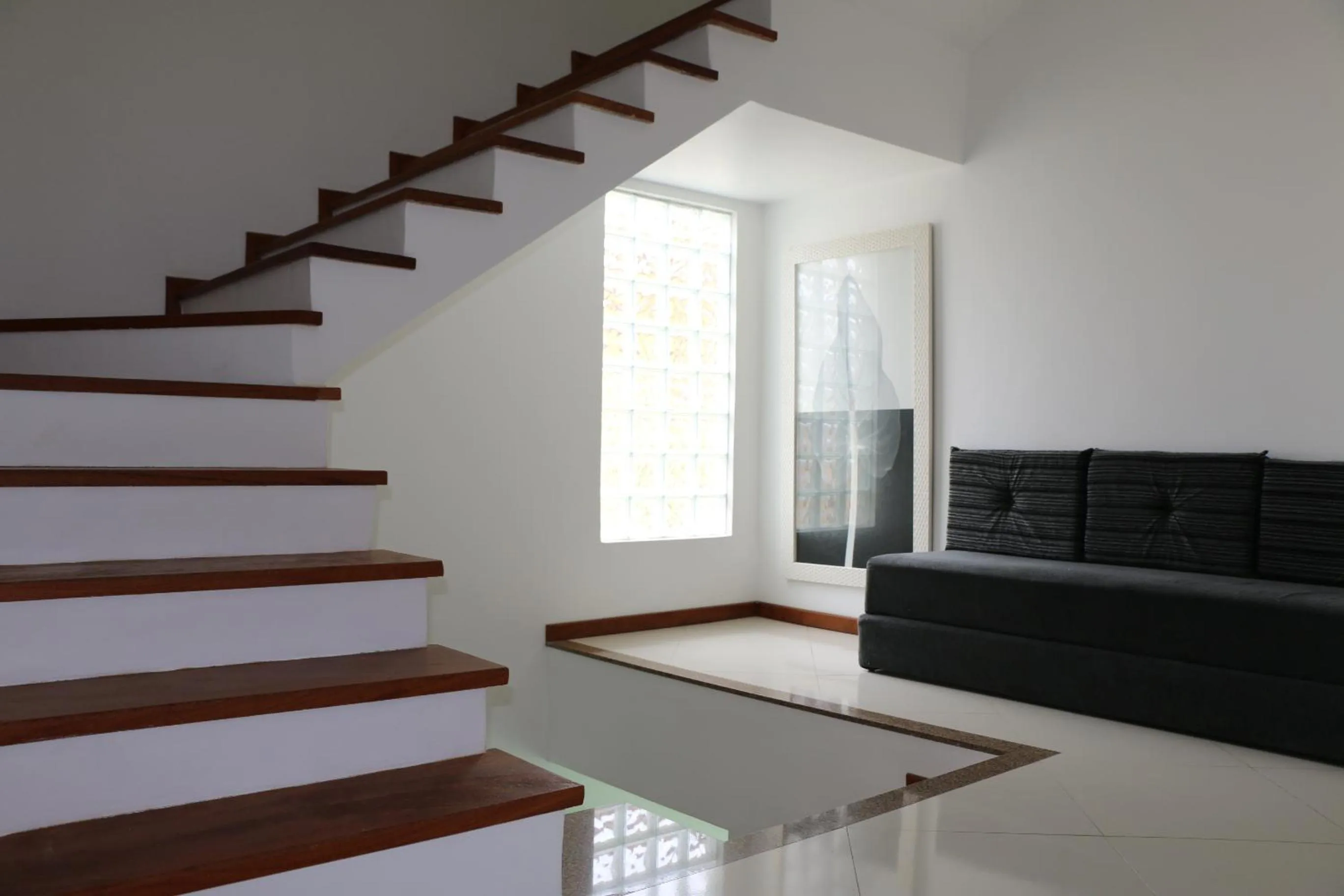 Seating area in Enseada Hostel