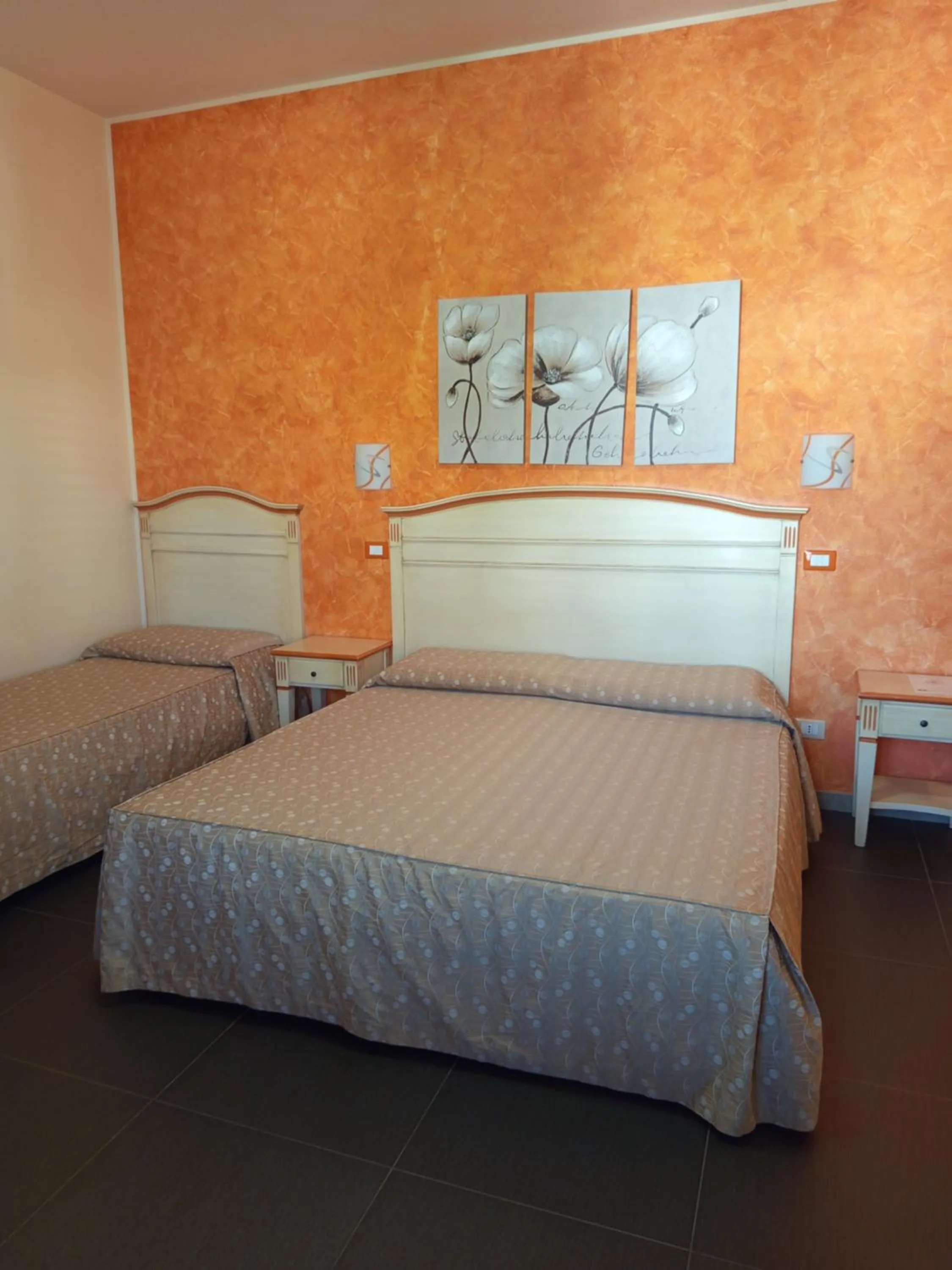 Bedroom in Amaryllis Hotel