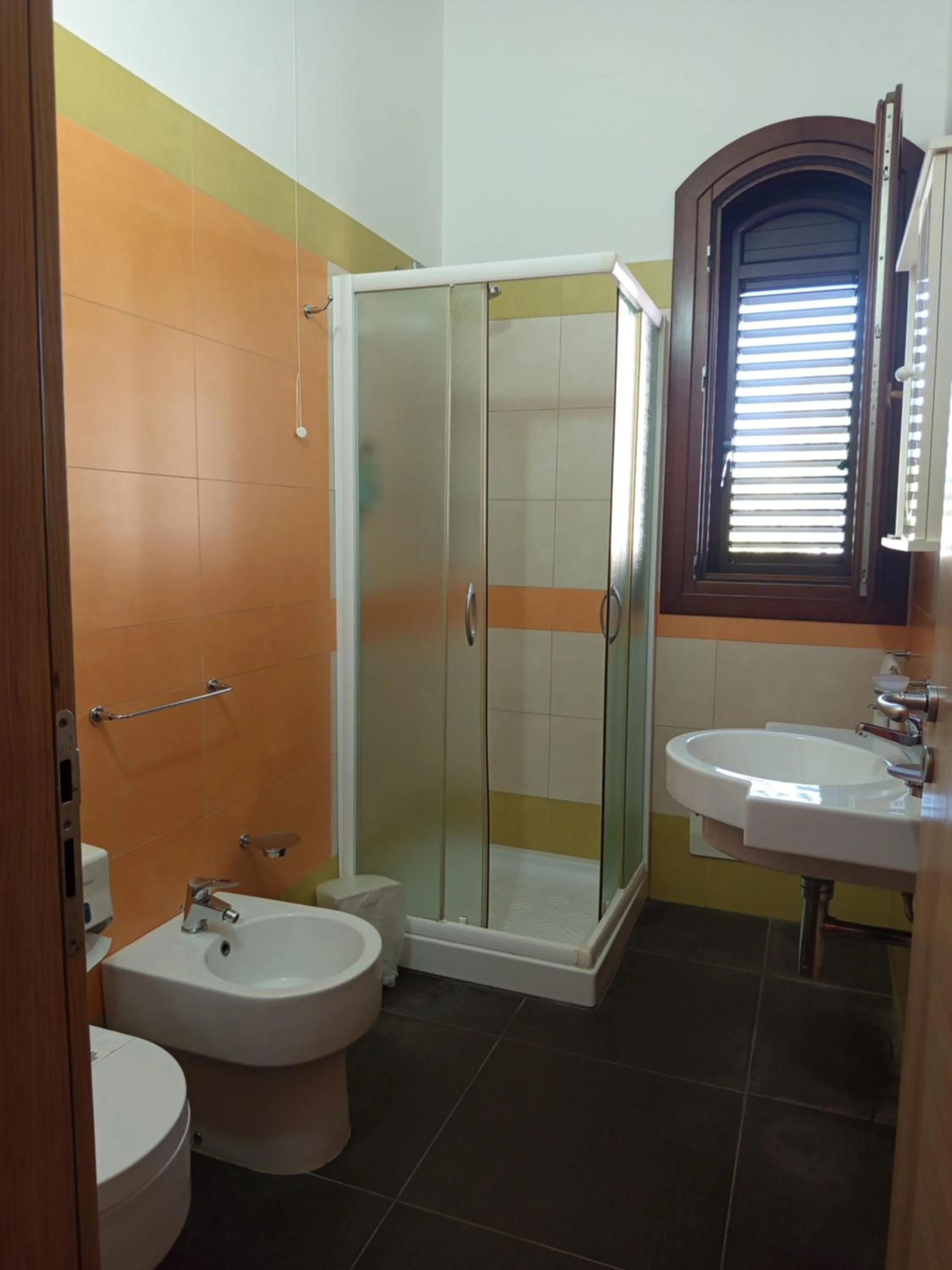 Bathroom in Amaryllis Hotel